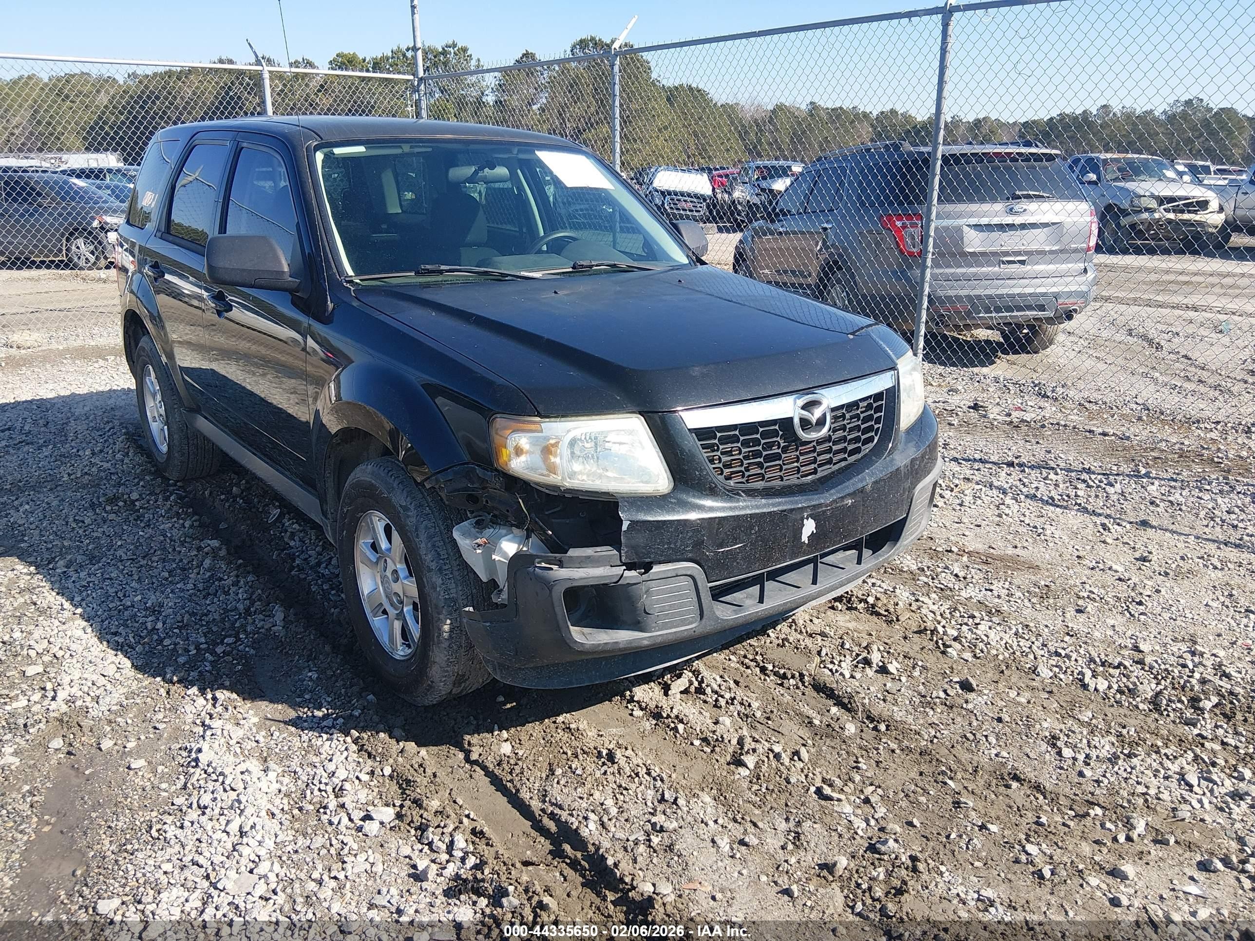 2011 Mazda Tribute Sport, VIN 4F2CY0C73BKM06473 — Перед