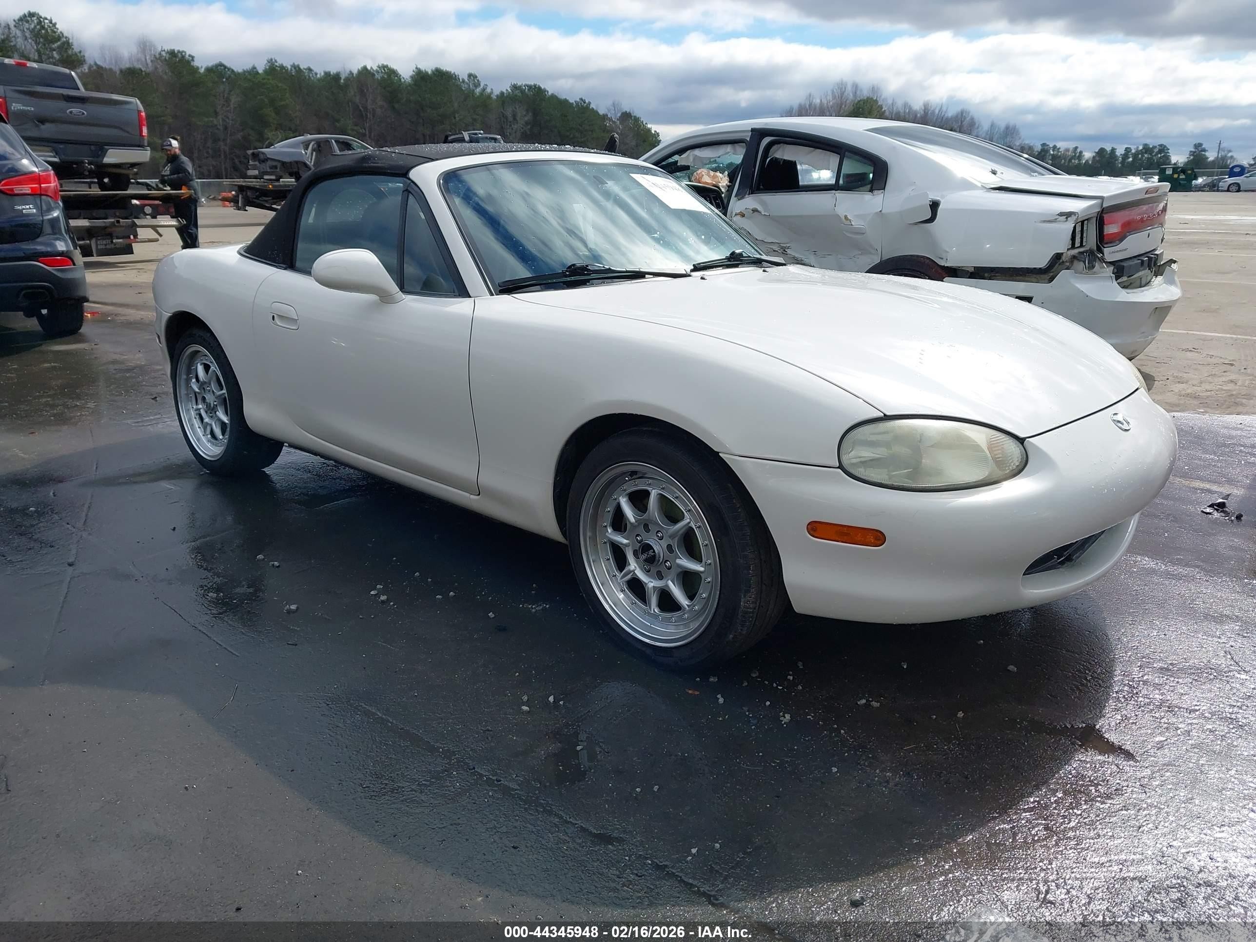 1999 Mazda MX-5 Miata, VIN JM1NB353XX0103571 — Side