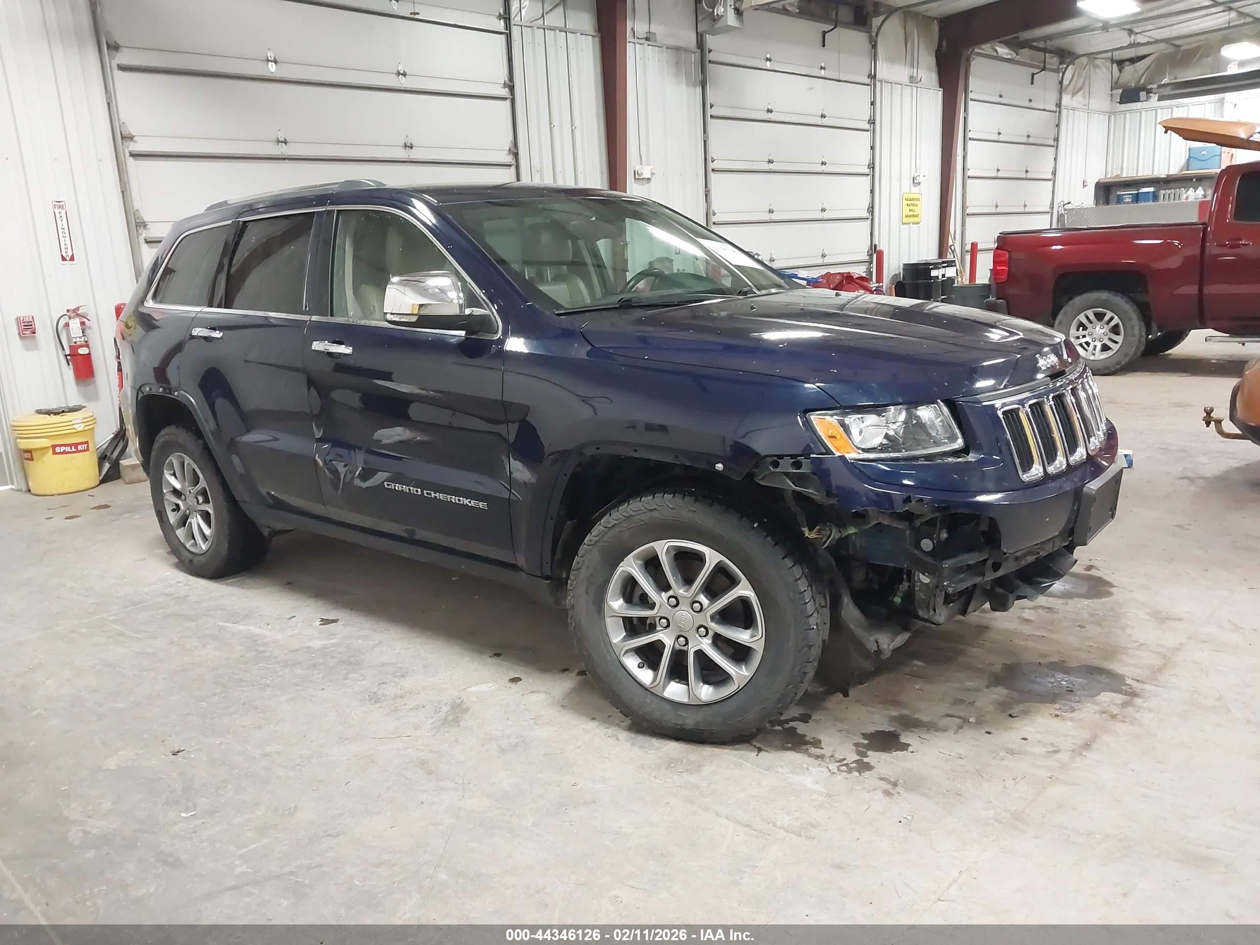 2015 Jeep Grand Cherokee Limited, VIN 1C4RJFBG5FC242971 — Side