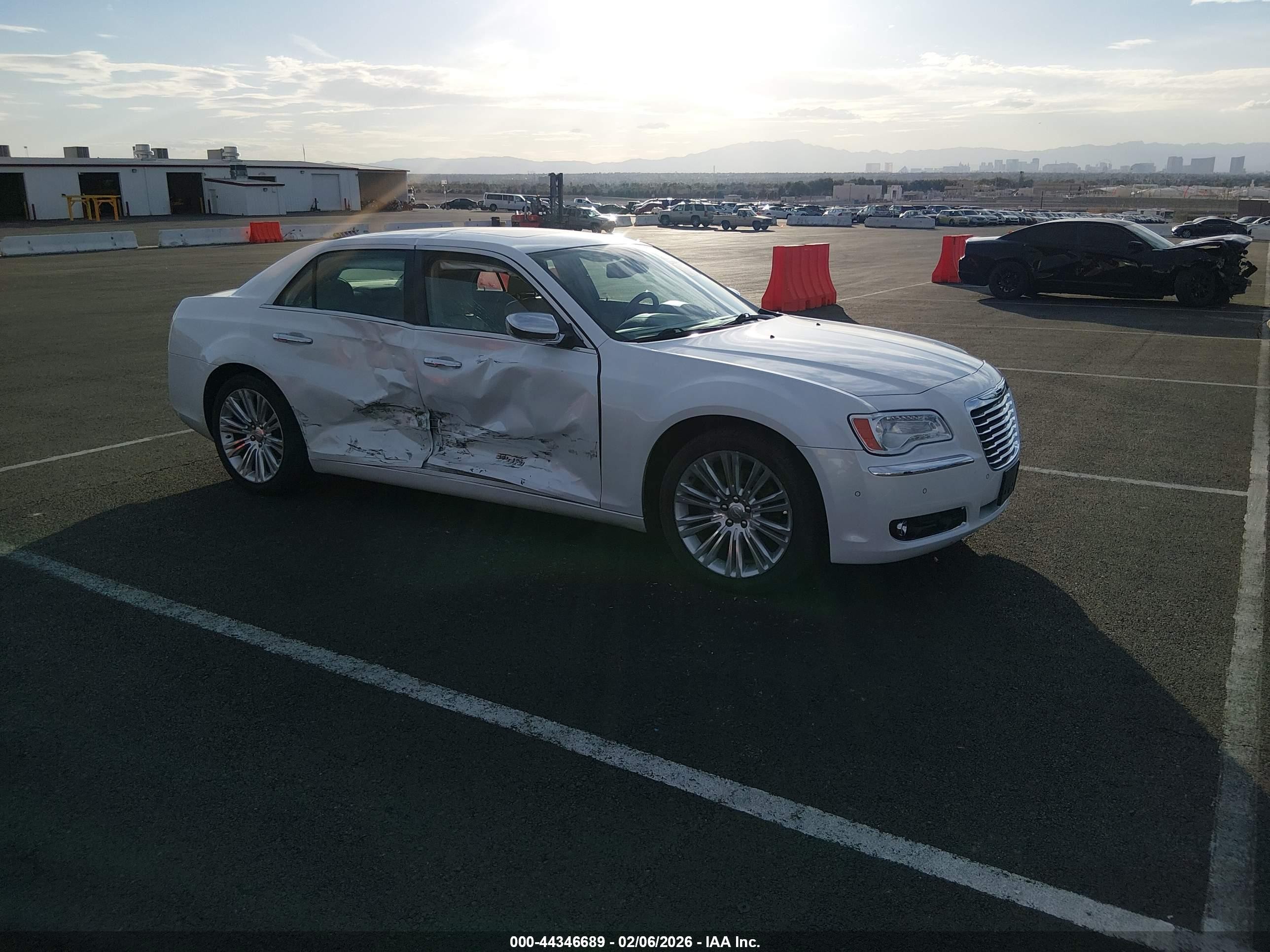 2011 Chrysler 300 C, VIN 2C3CA6CT3BH531456 — Side