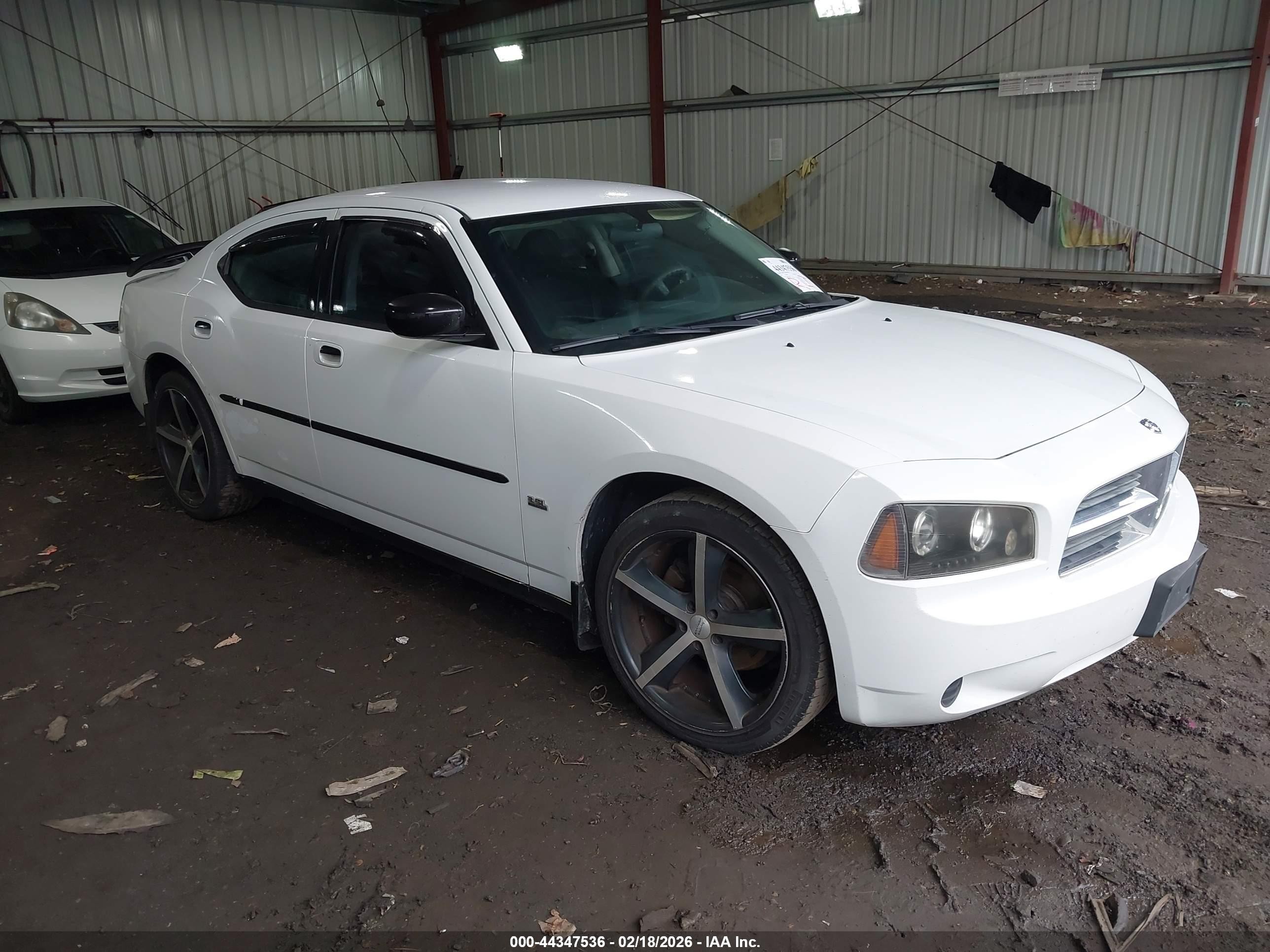 2010 Dodge Charger 3.5L, VIN 2B3CA2CV6AH258292 — Side