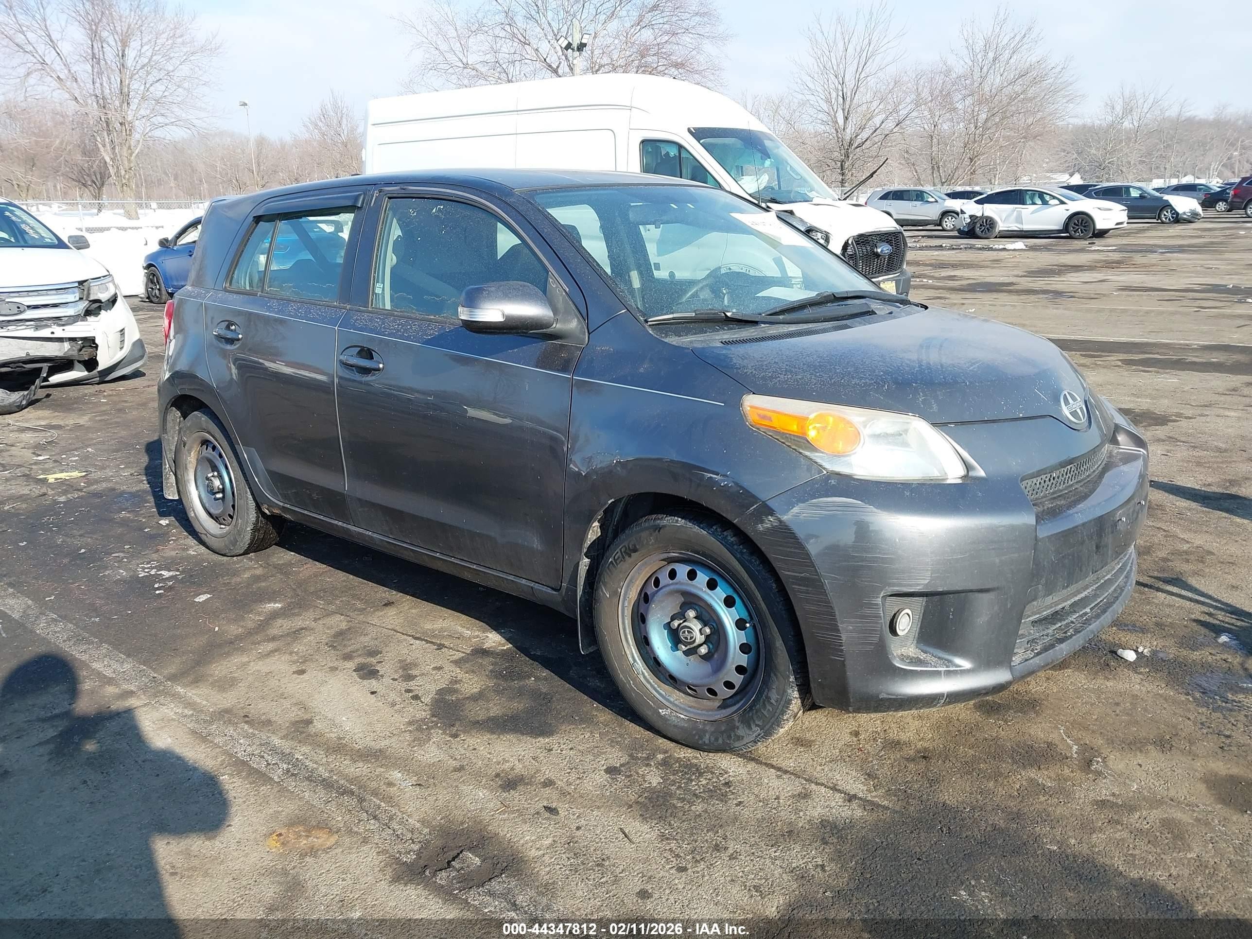 2010 Scion xD, VIN JTKKU4B49AJ059072 — Side