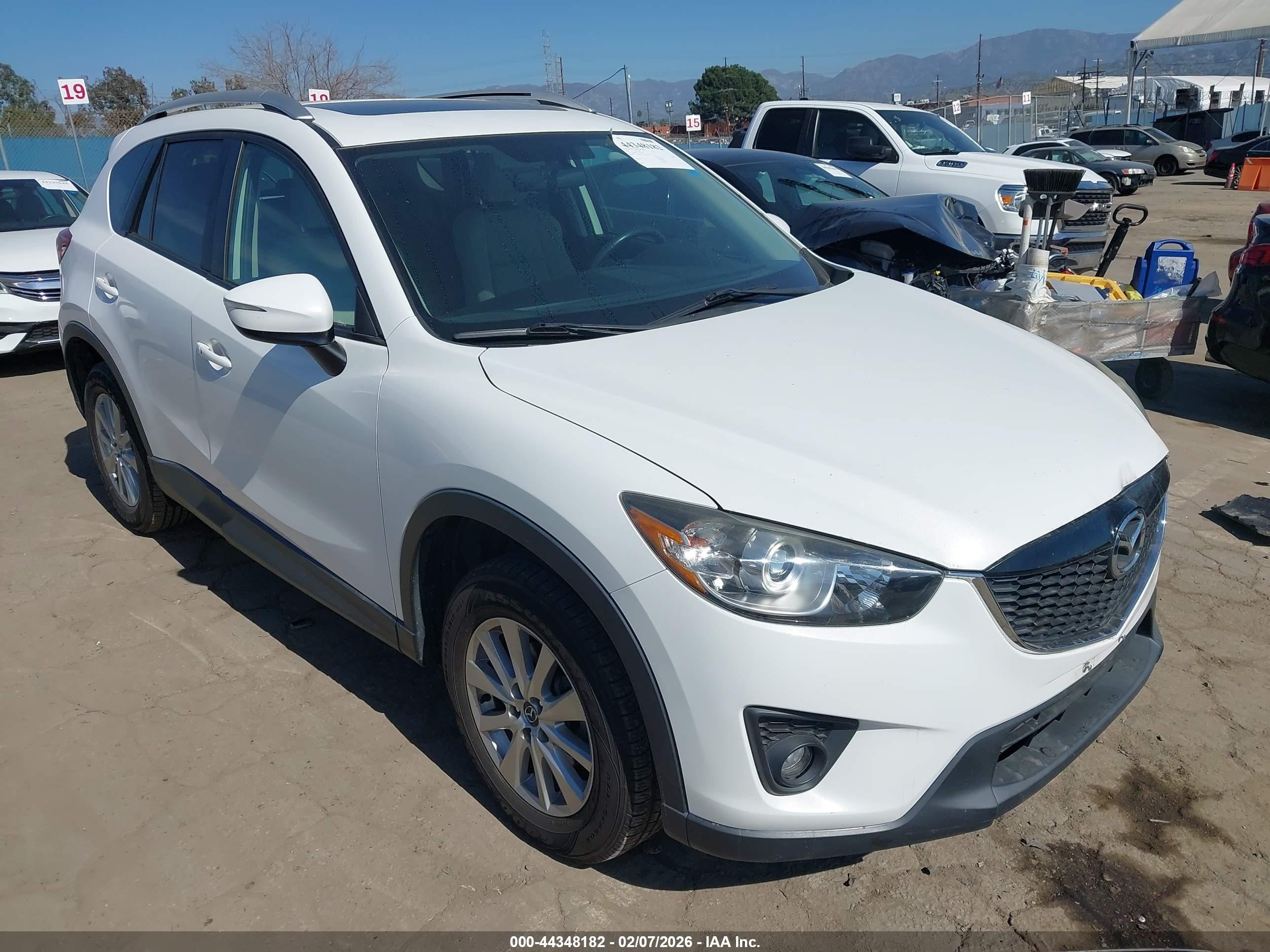 2015 Mazda CX-5 Touring, VIN JM3KE2CY7F0532806 — Пресная вода