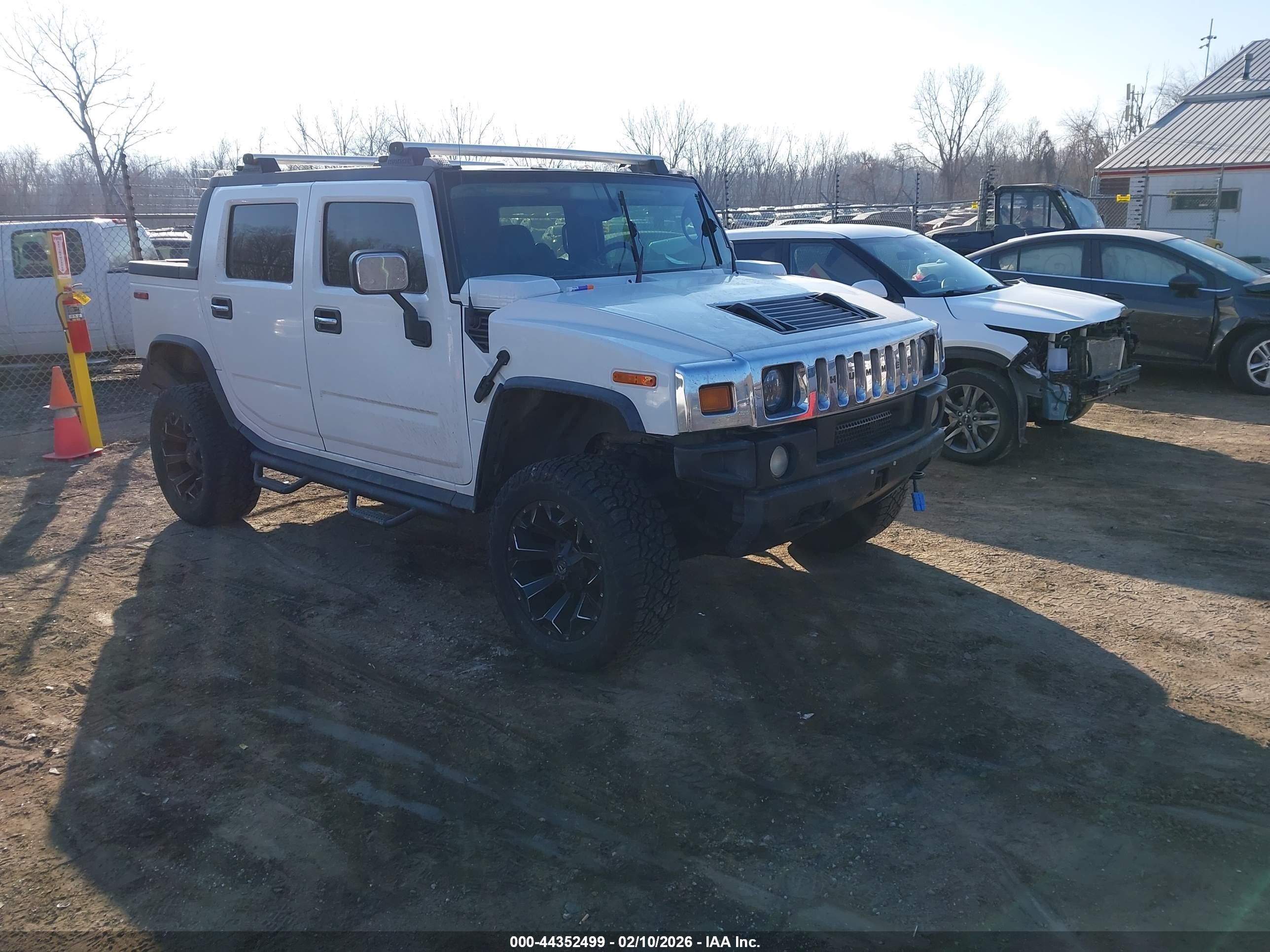 2005 Hummer H2 SUT, VIN 5GRGN22U65H122820 — Rear end