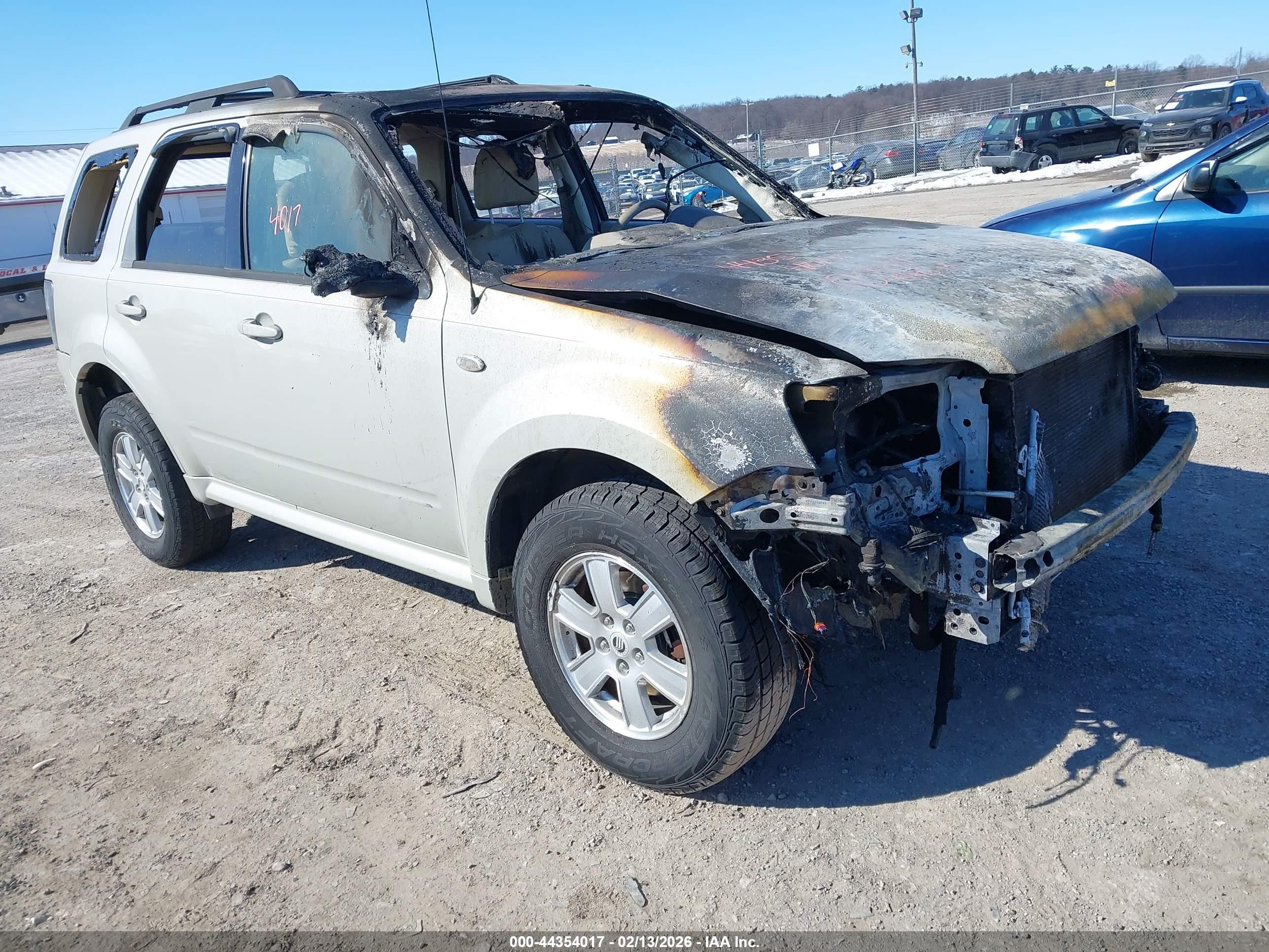 2009 Mercury Mariner, VIN 4M2CU91789KJ01607 — Auction photo 1 of 5