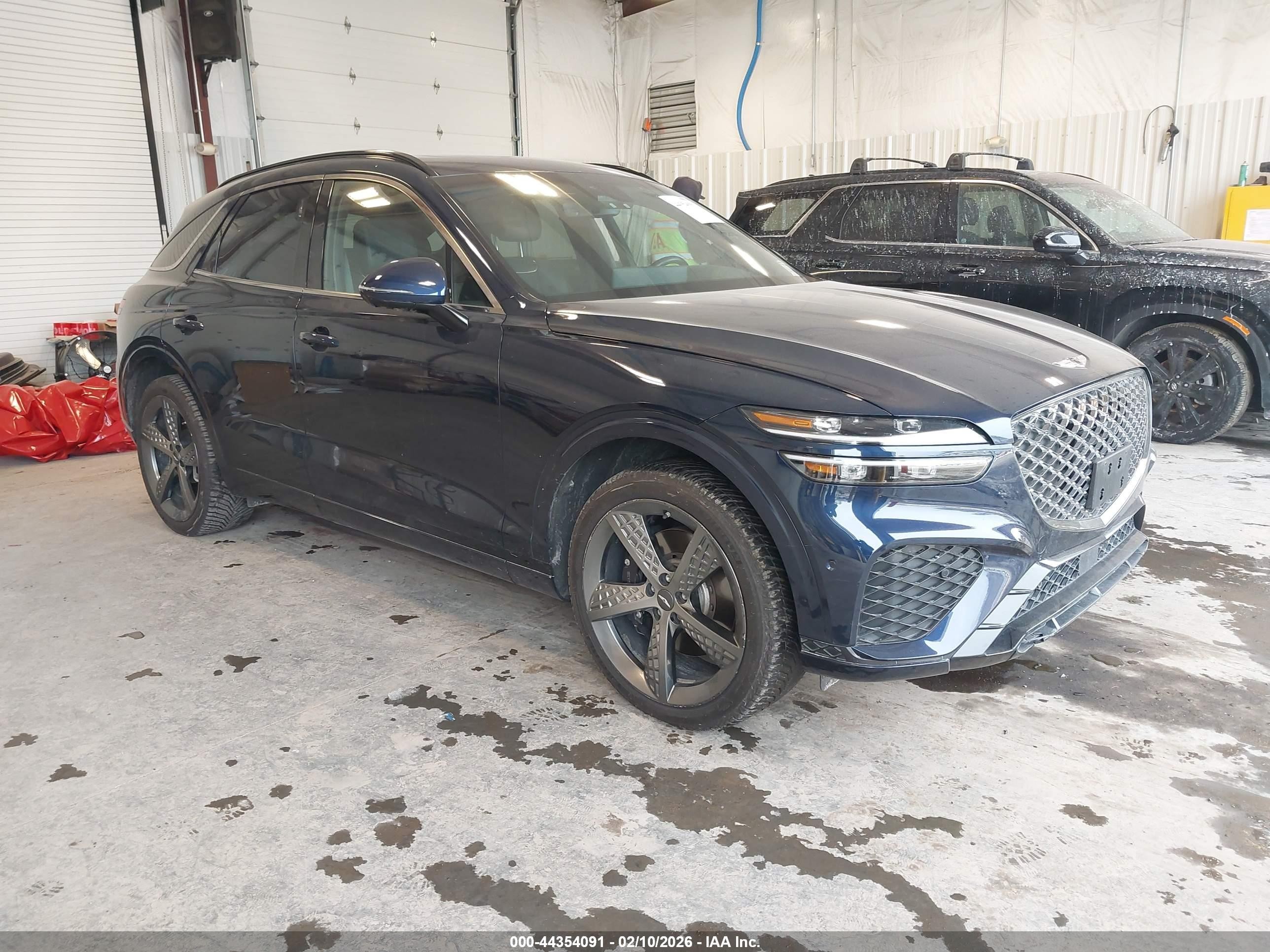 2022 Genesis GV70 Sport, VIN KMUMCDTC5NU022384 — Side