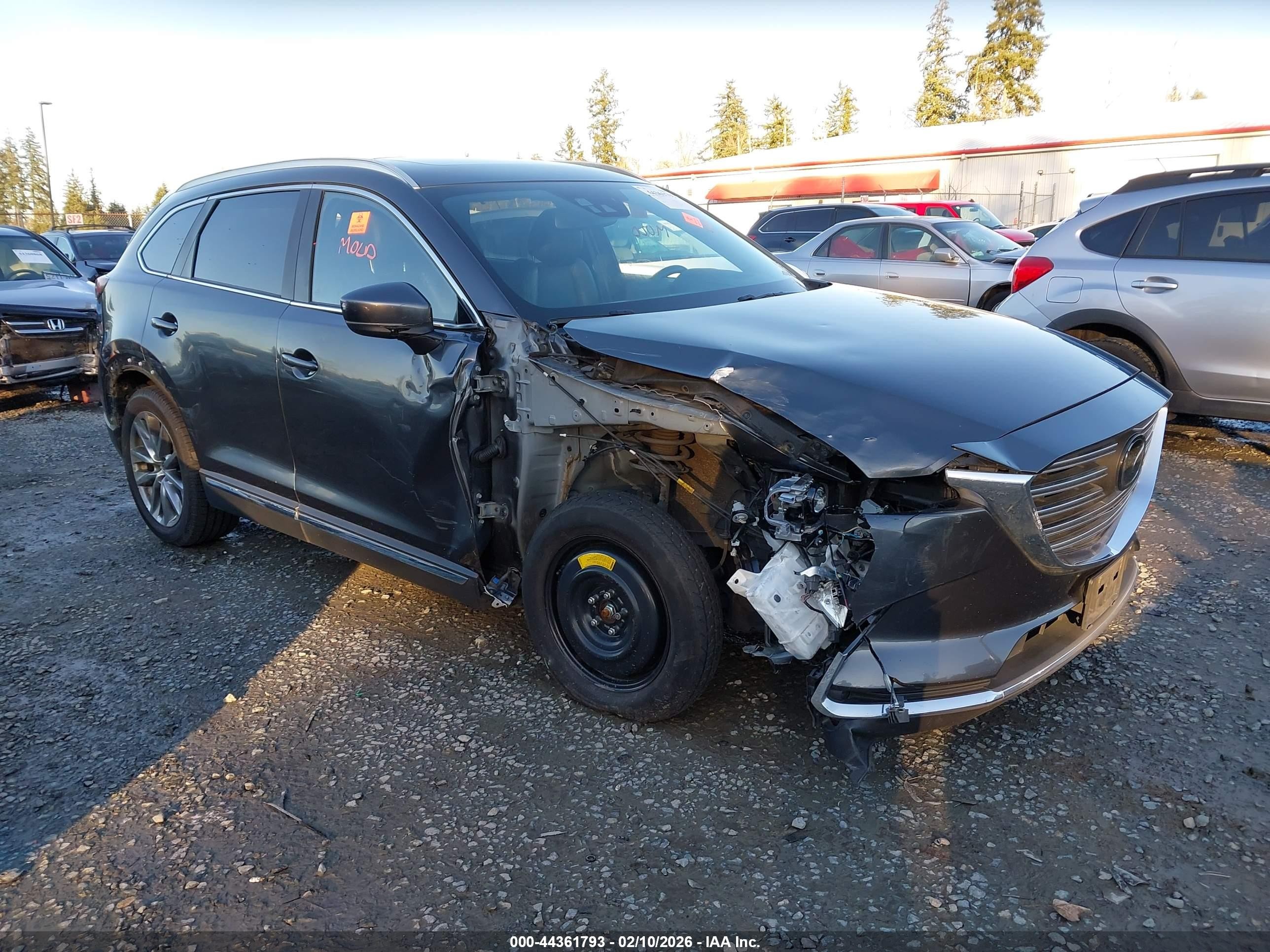 2017 Mazda CX-9 Grand Touring, VIN JM3TCBDY9H0131012 — Бок