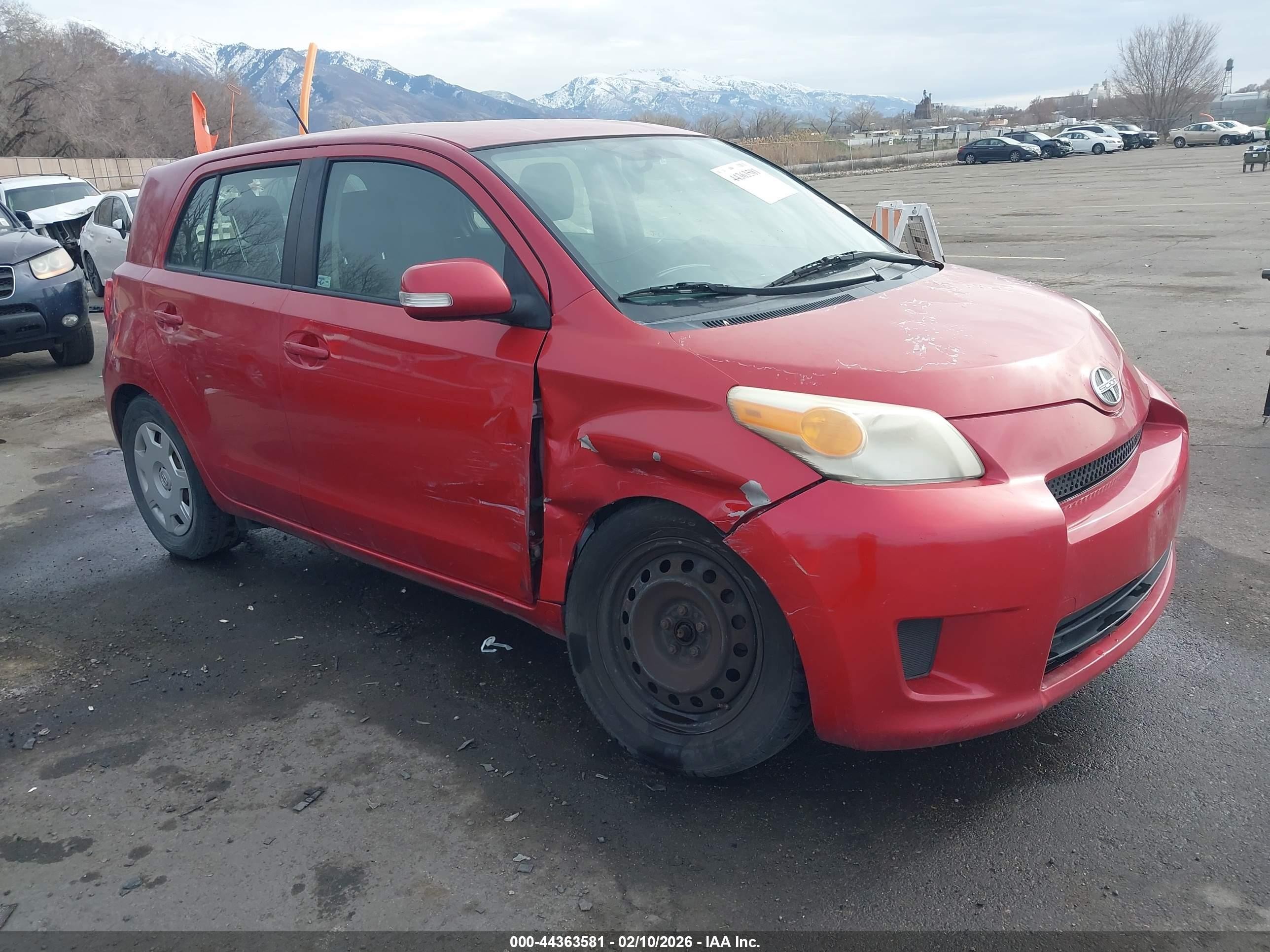 2010 Scion xD, VIN JTKKU4B40AJ052950 — Side
