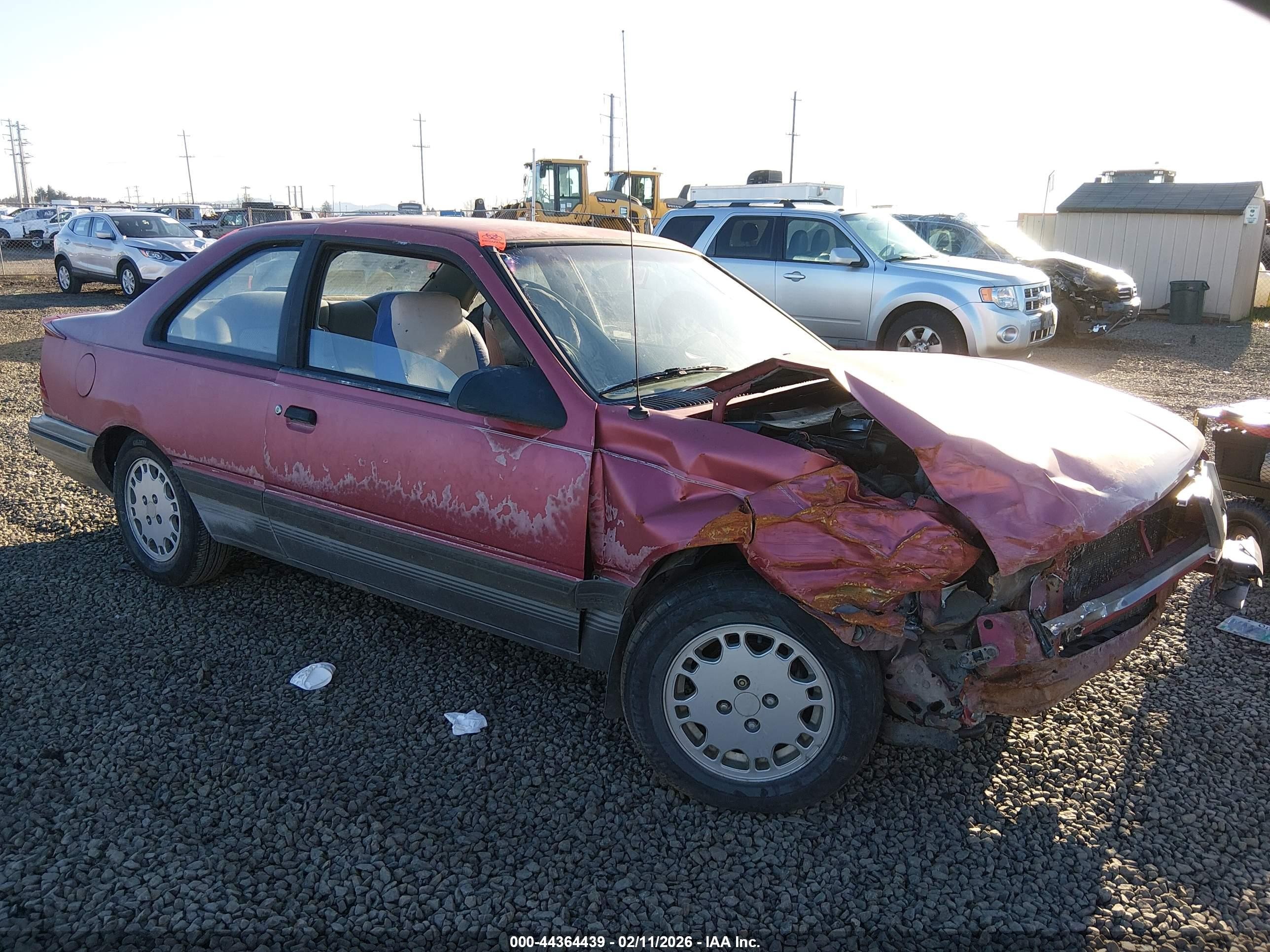 1989 Mercury Topaz, VIN 1MEPM33S5KK610161 — Перед