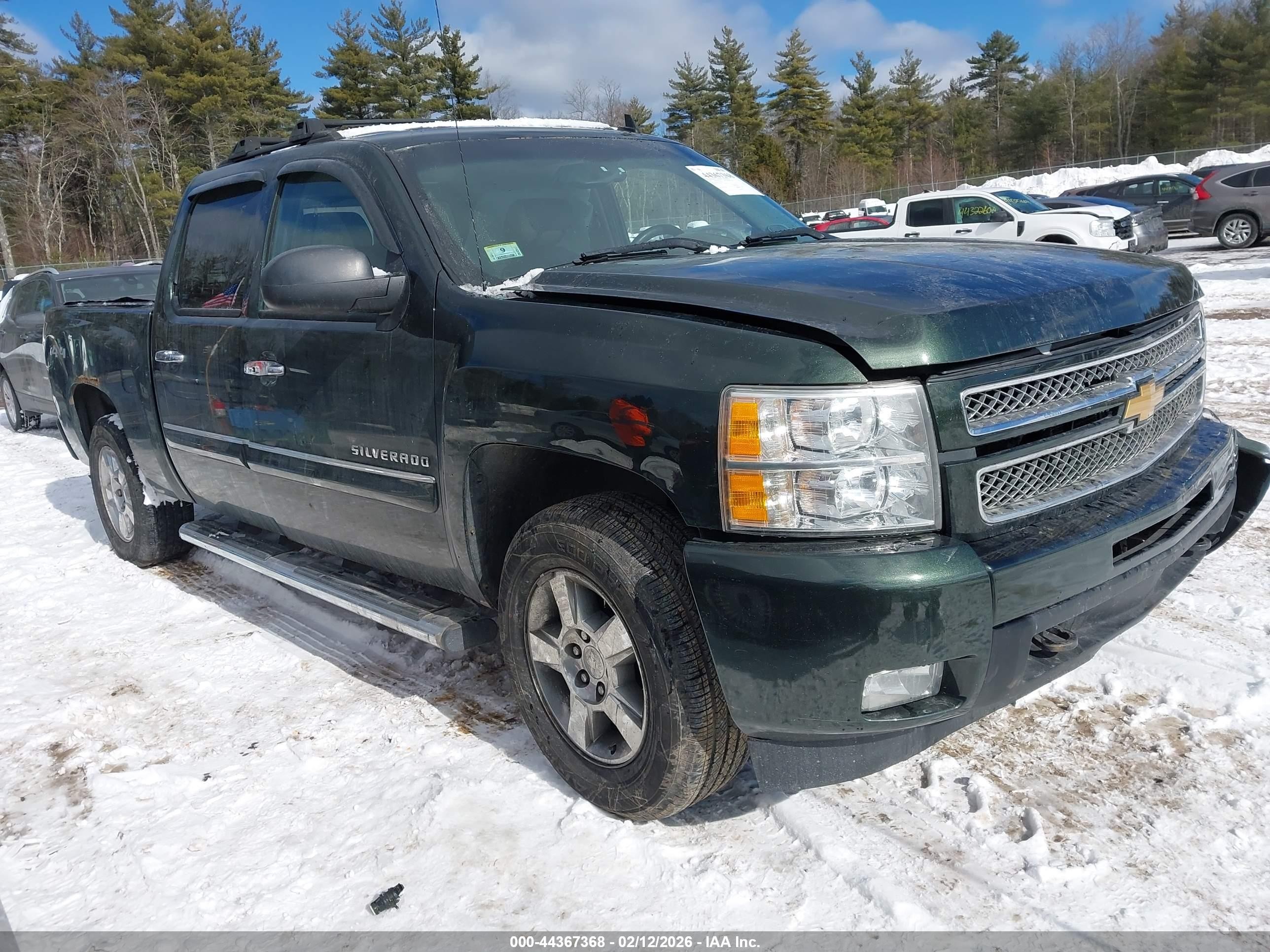 2013 Chevrolet Silverado 1500 LTZ, VIN 3GCPKTE70DG235306 — Side