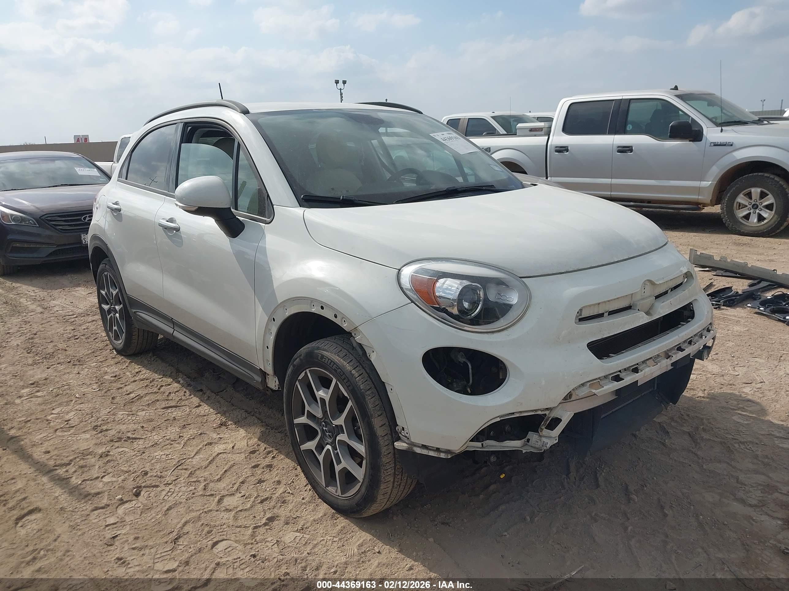 2019 FIAT 500X Urbana Edition, VIN ZFBNFYB1XKP771877 — Side