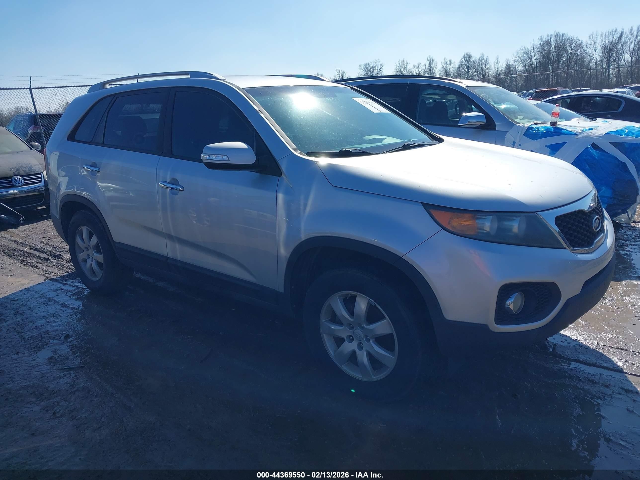 2011 Kia Sorento, VIN 5XYKT3A1XBG006927 — Storm