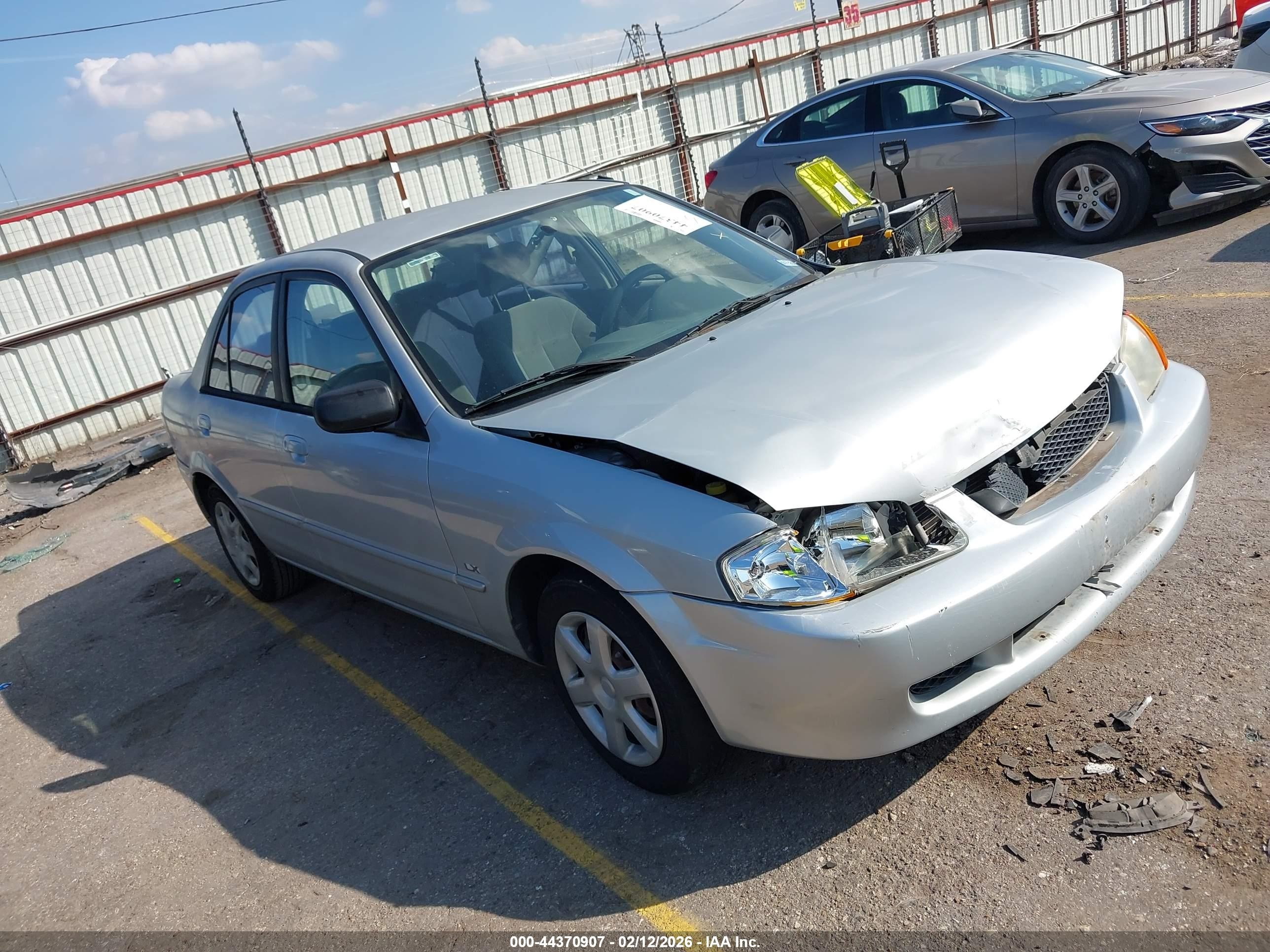 2000 Mazda Protege DX, VIN JM1BJ2224Y0279710 — Front end