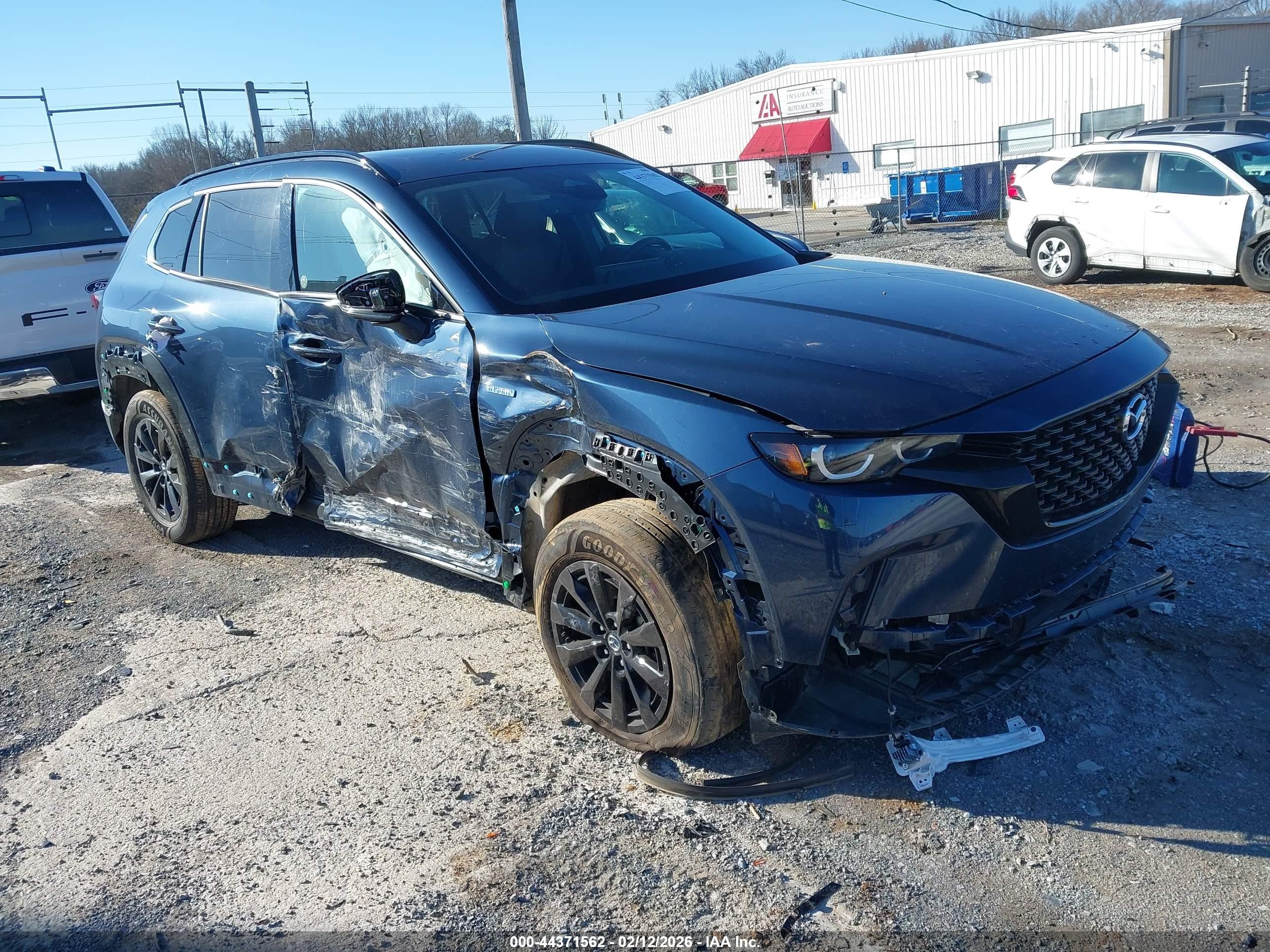 2025 Mazda CX-50 Hybrid Premium Package, VIN 7MMVAADW6SN131169 — Side