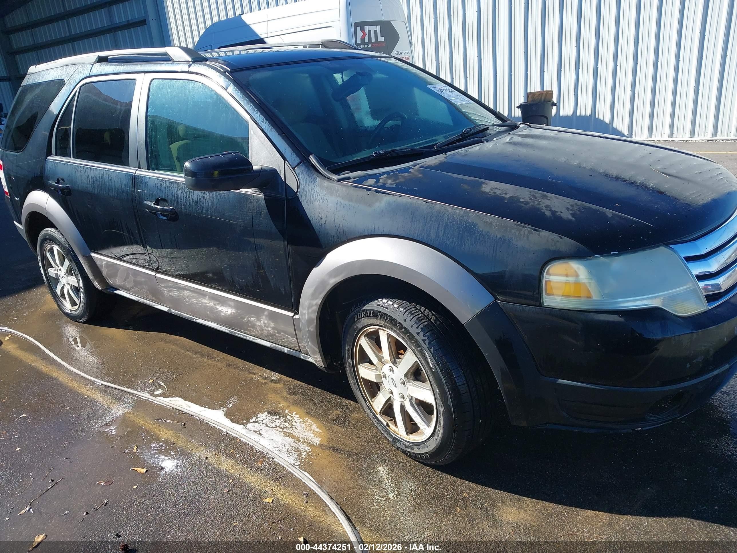 2008 Ford Taurus X SEL, VIN 1FMDK02WX8GA45152 — Rear end