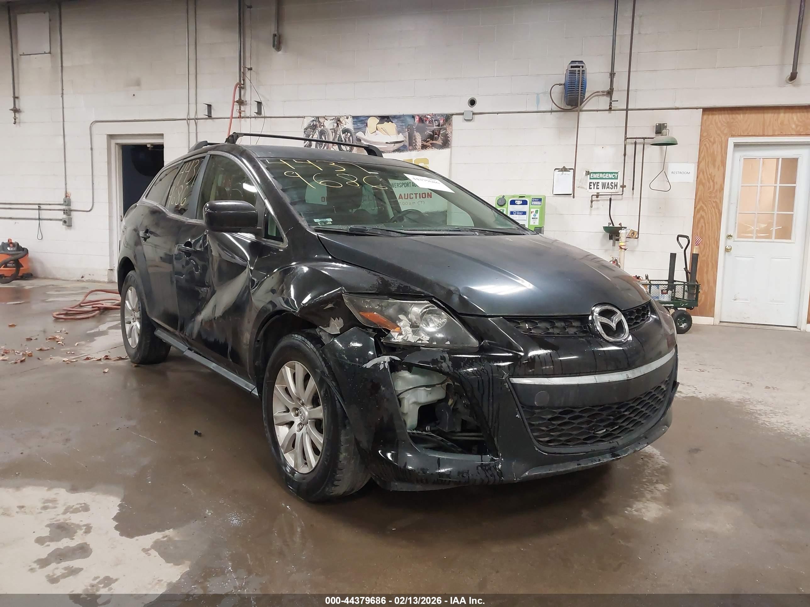 2011 Mazda CX-7 i Sport, VIN JM3ER2BM0B0382077 — Side