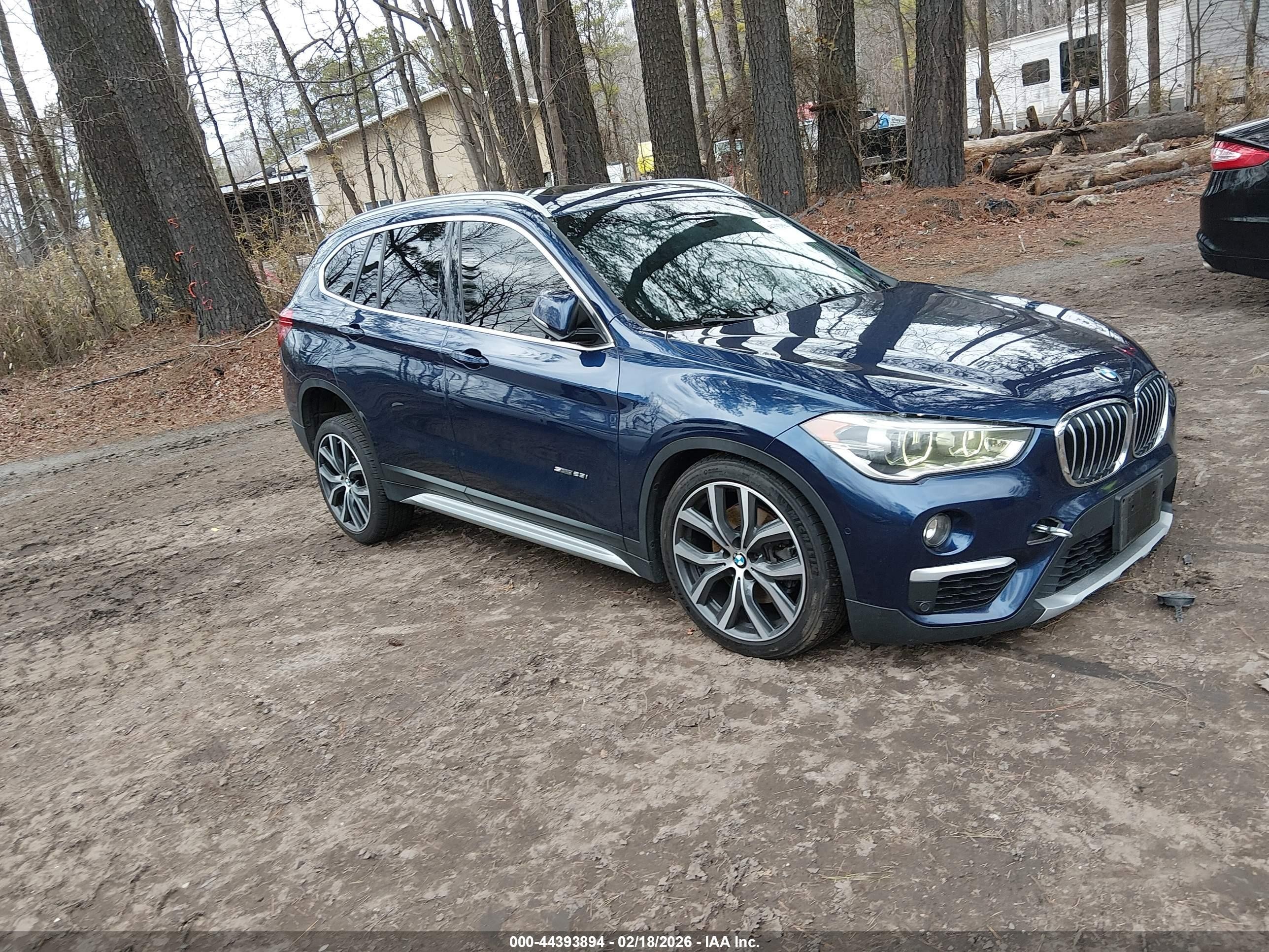 2017 BMW X1 sDrive28i, VIN WBXHU7C38H5H37148 — Front end