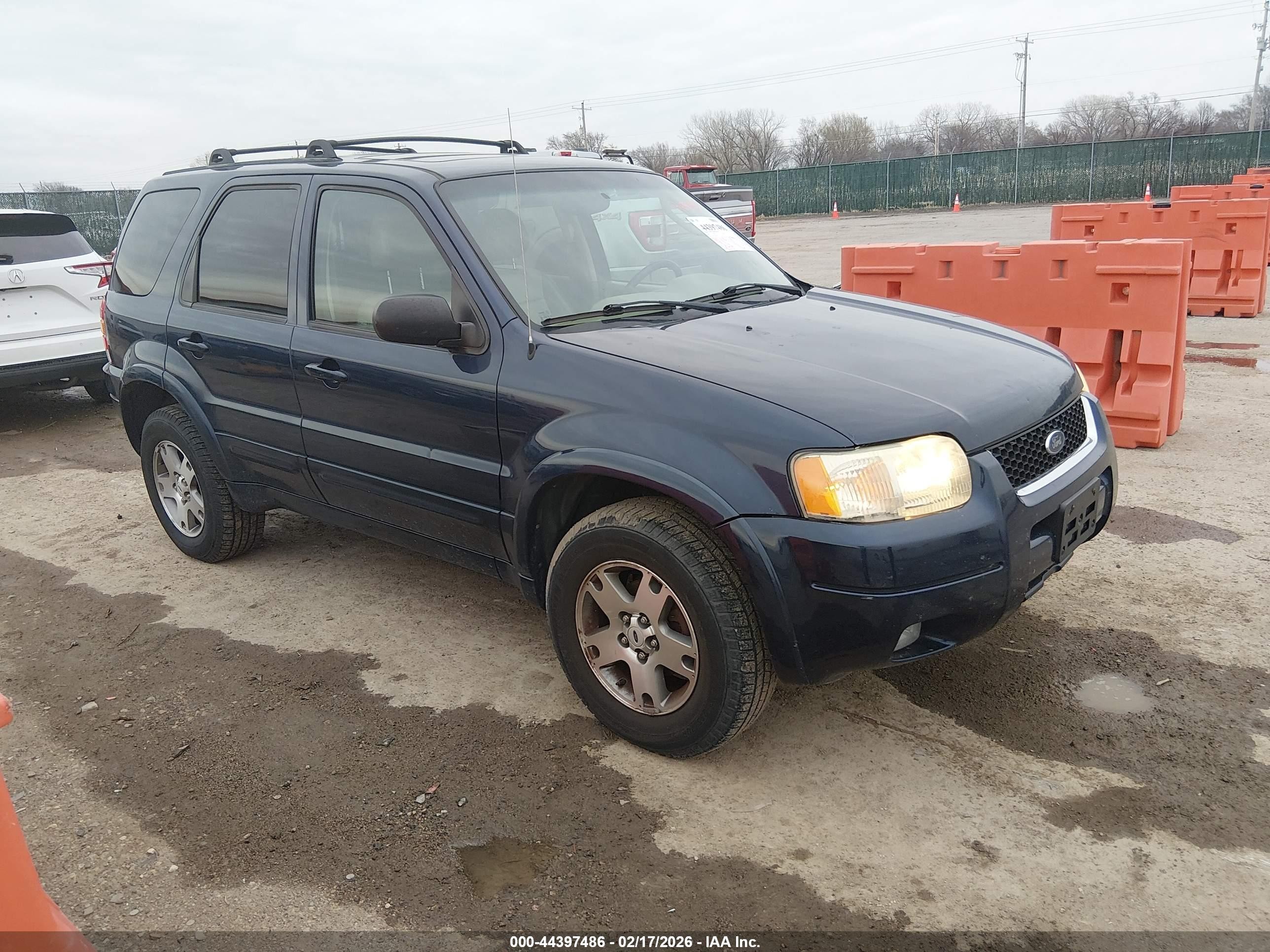 2004 Ford Escape Limited, VIN 1FMCU94154KB10573 — Зад