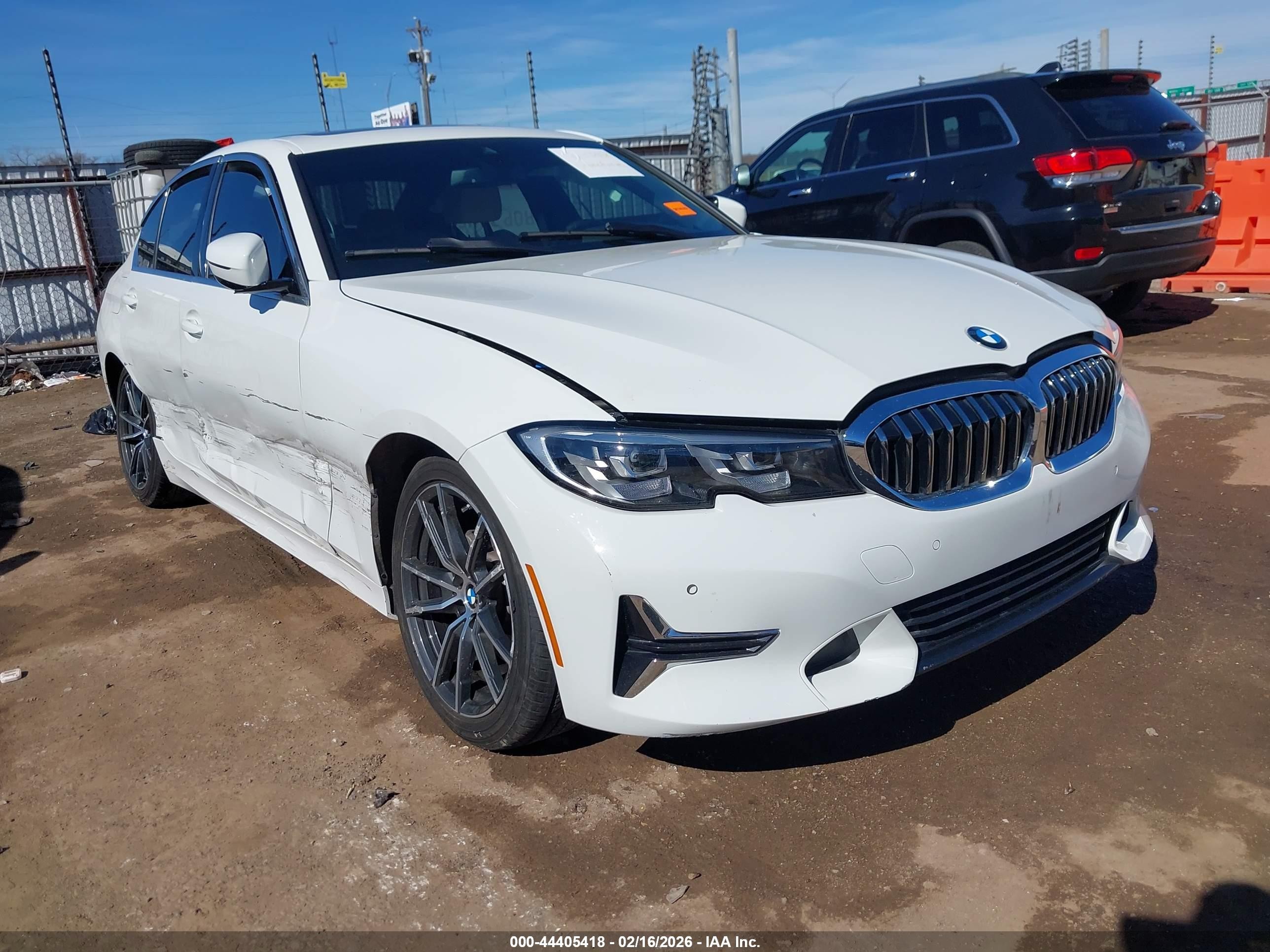 2019 BMW 3 Series 330i, VIN WBA5R1C56KFH18080 — Side
