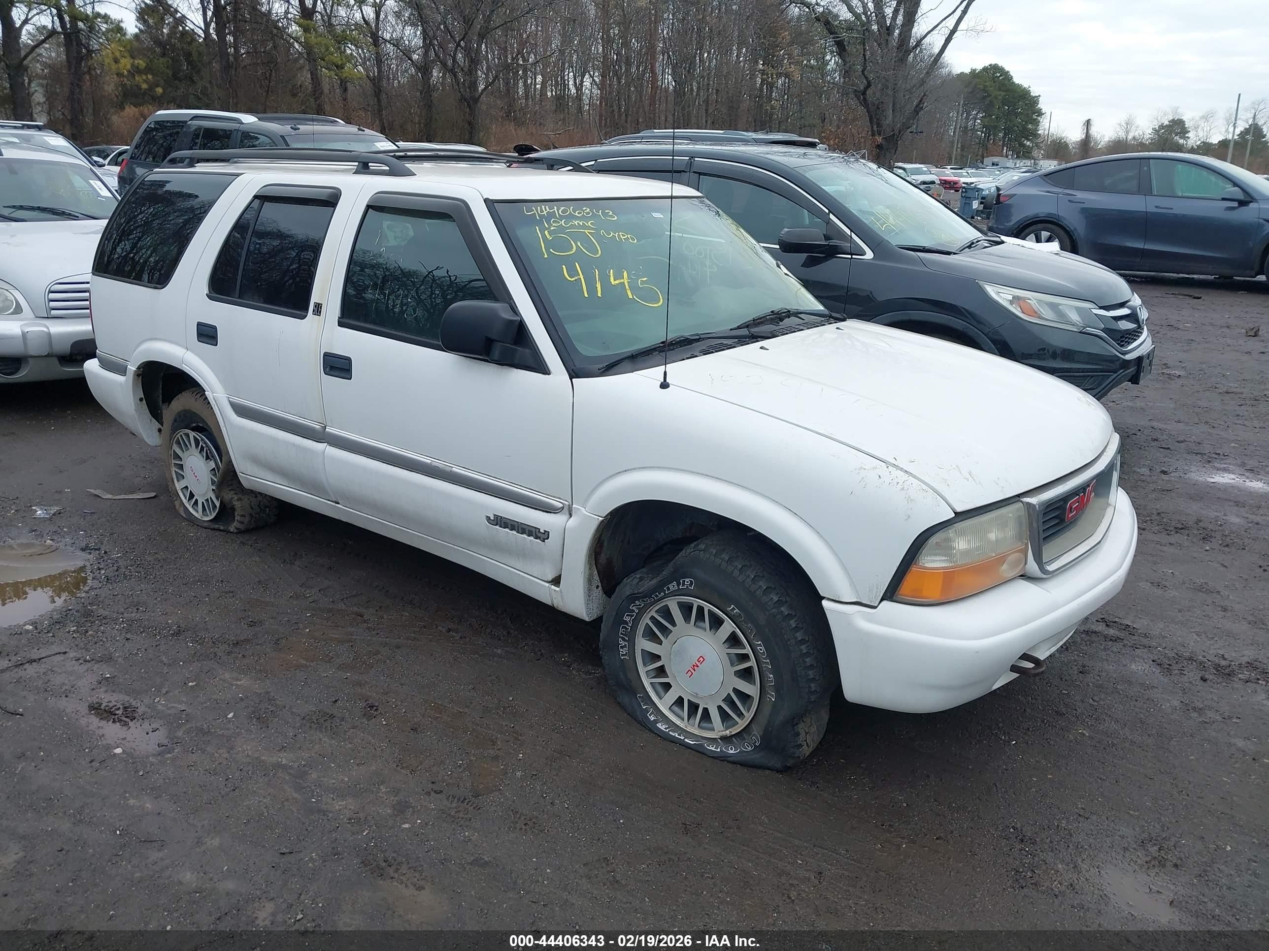 2001 GMC Jimmy SLE, VIN 1GKDT13W712216873 — По всему кузову