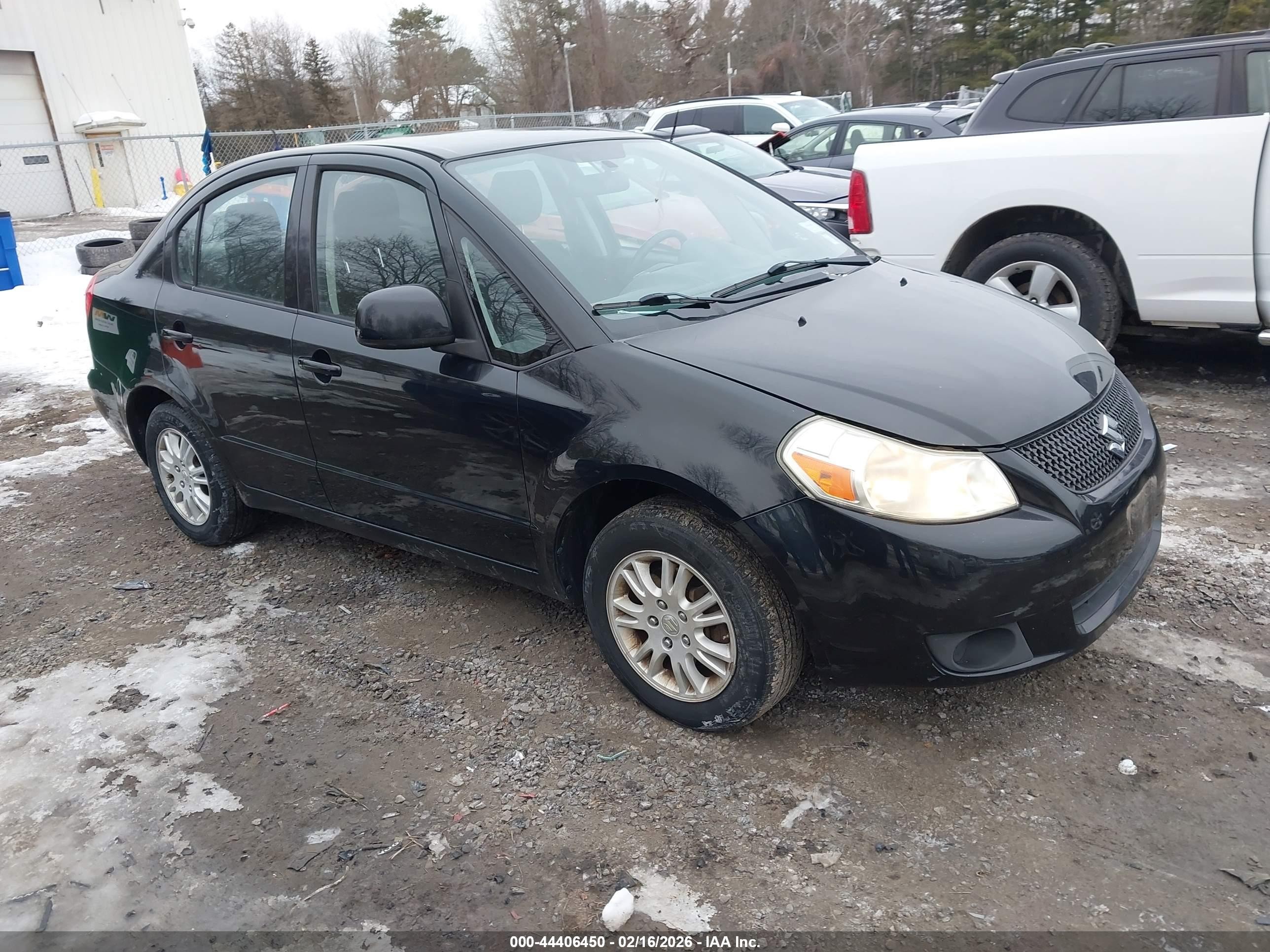 2012 Suzuki SX4 LE, VIN JS2YC5A3XC6304511 — Rear end