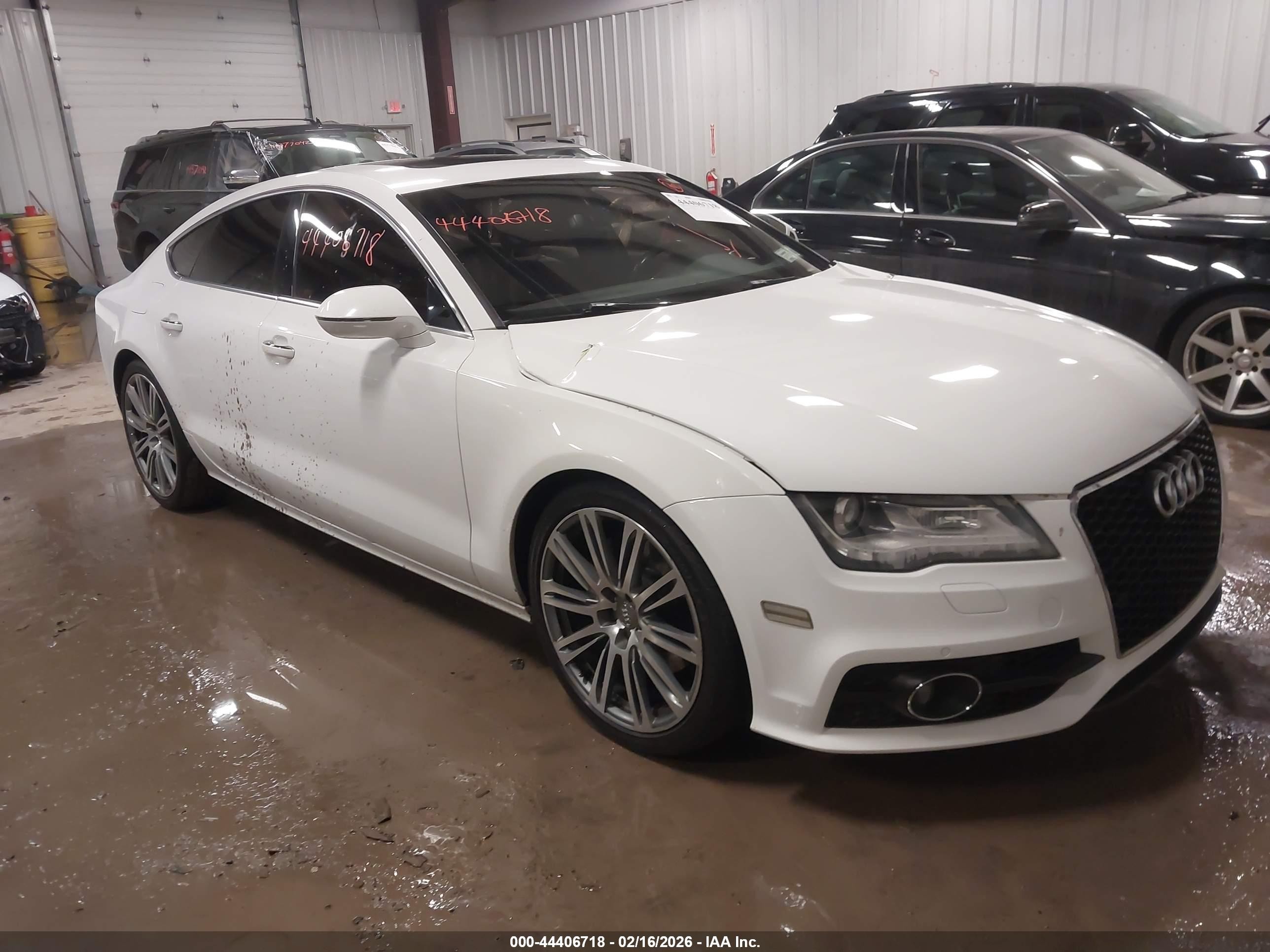 2014 Audi A7 Premium Plus, VIN WAUWMAFC0EN135752 — Storm