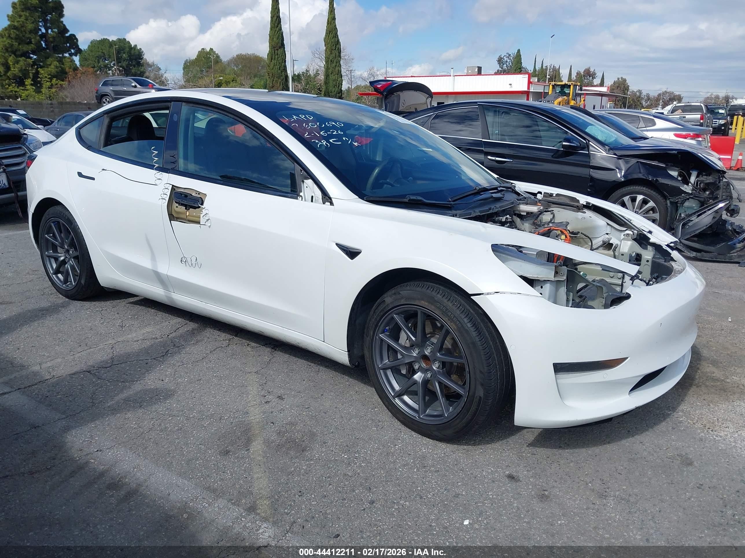 2021 Tesla Model 3 Standard Range Plus, VIN 5YJ3E1EA3MF009479 — Vandalism