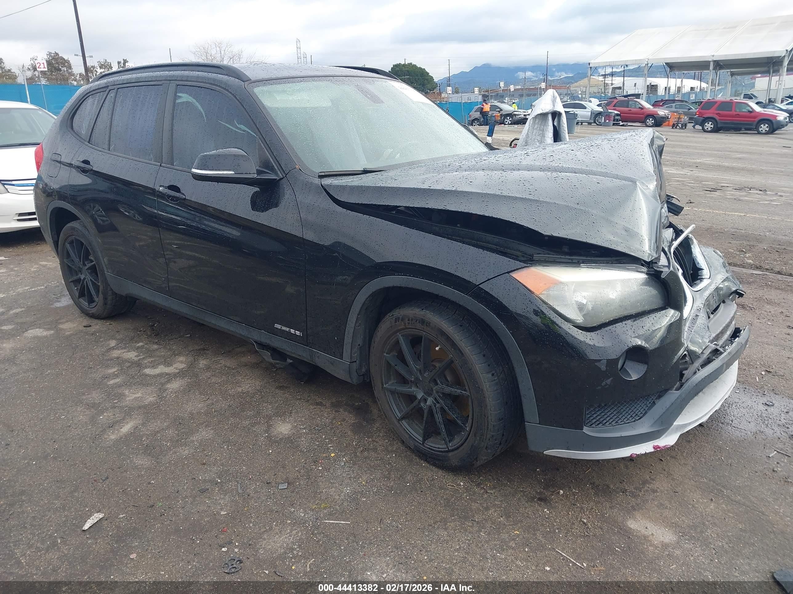 2015 BMW X1 sDrive28i, VIN WBAVM1C5XFVW58778 — Auction photo
