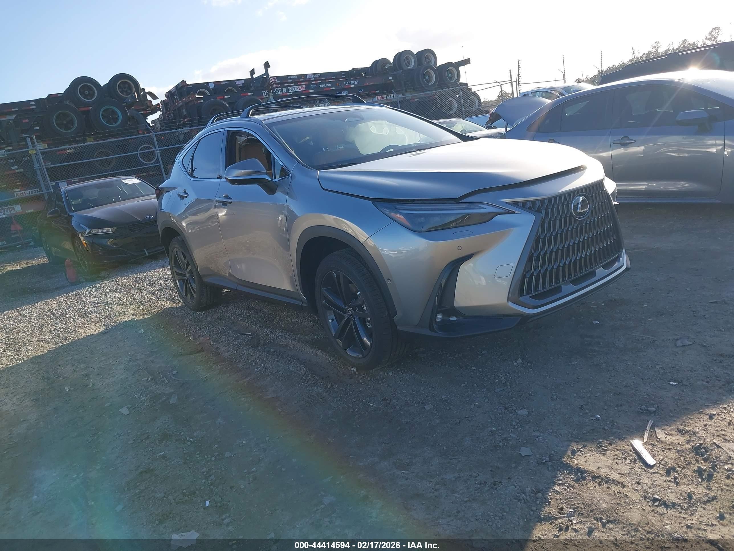 2026 Lexus NX 450h+ Luxury, VIN JTJHKCFZ4T2079814 — Бок