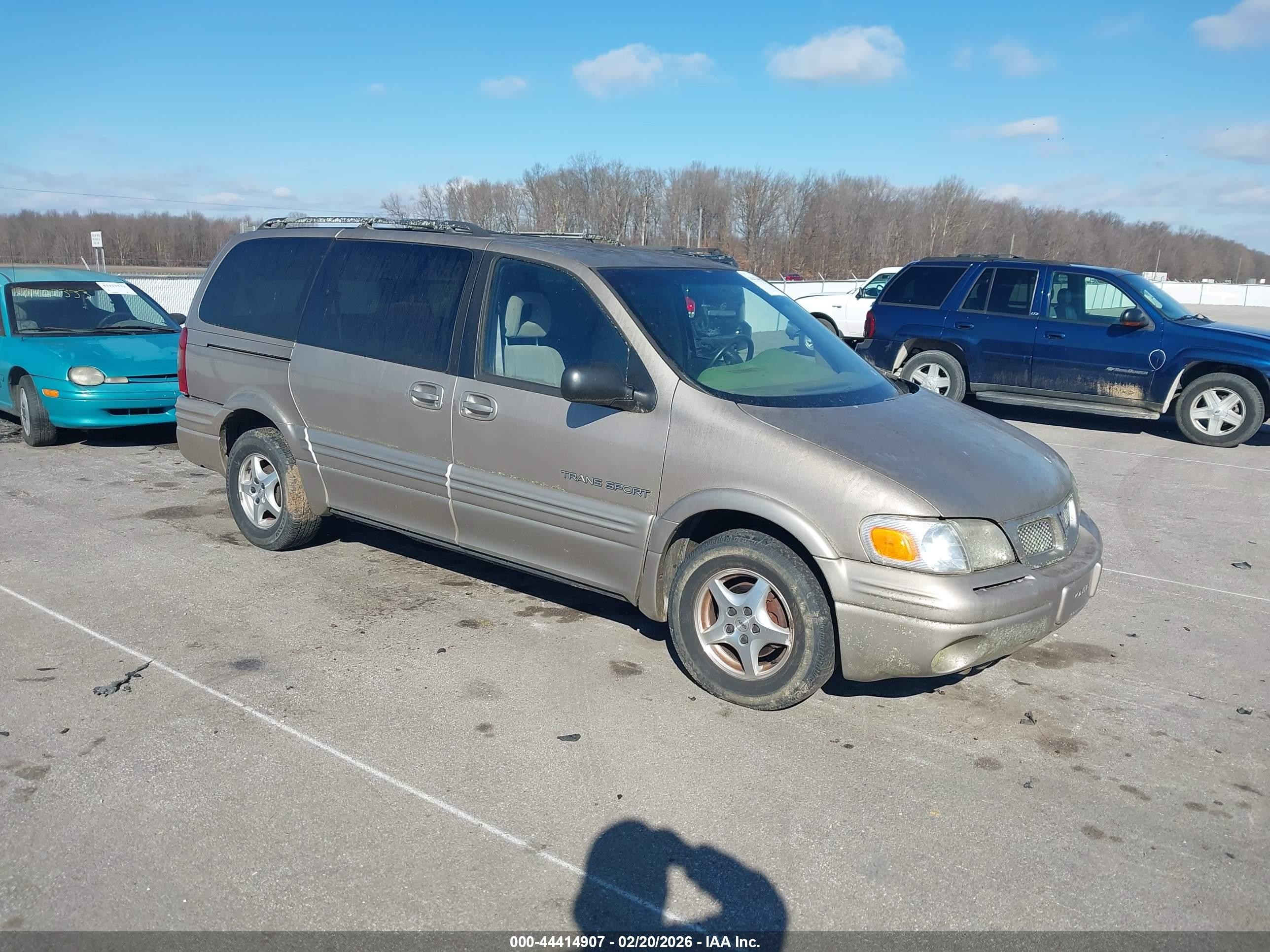 1997 Pontiac Montana 1SA, VIN 1GMDX03E6VD291829 — Side