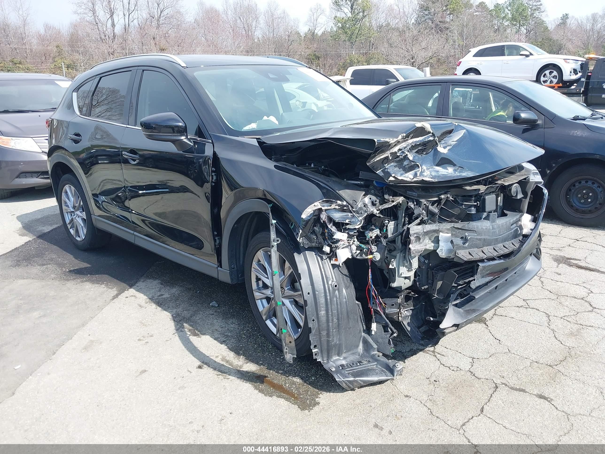 2021 Mazda CX-5 Grand Touring, VIN JM3KFADM9M1396320 — Front end
