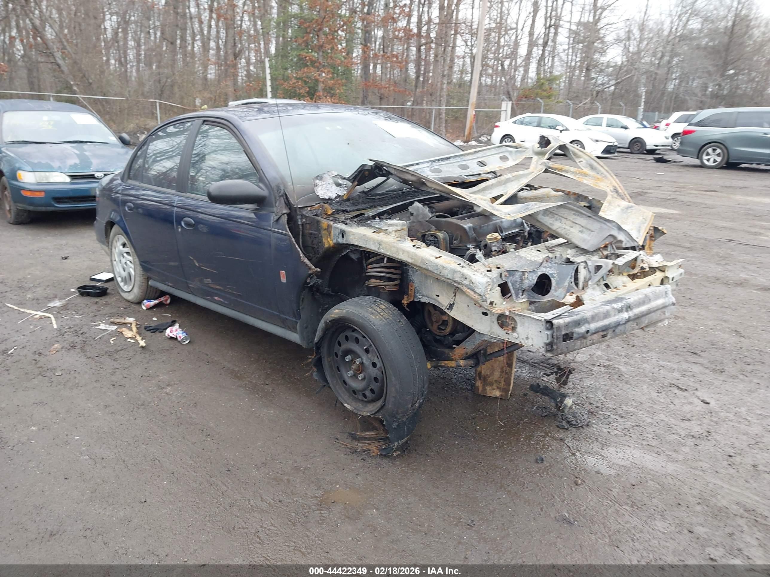 1999 Saturn SL, VIN 1G8ZK5277XZ360424 — Engine fire