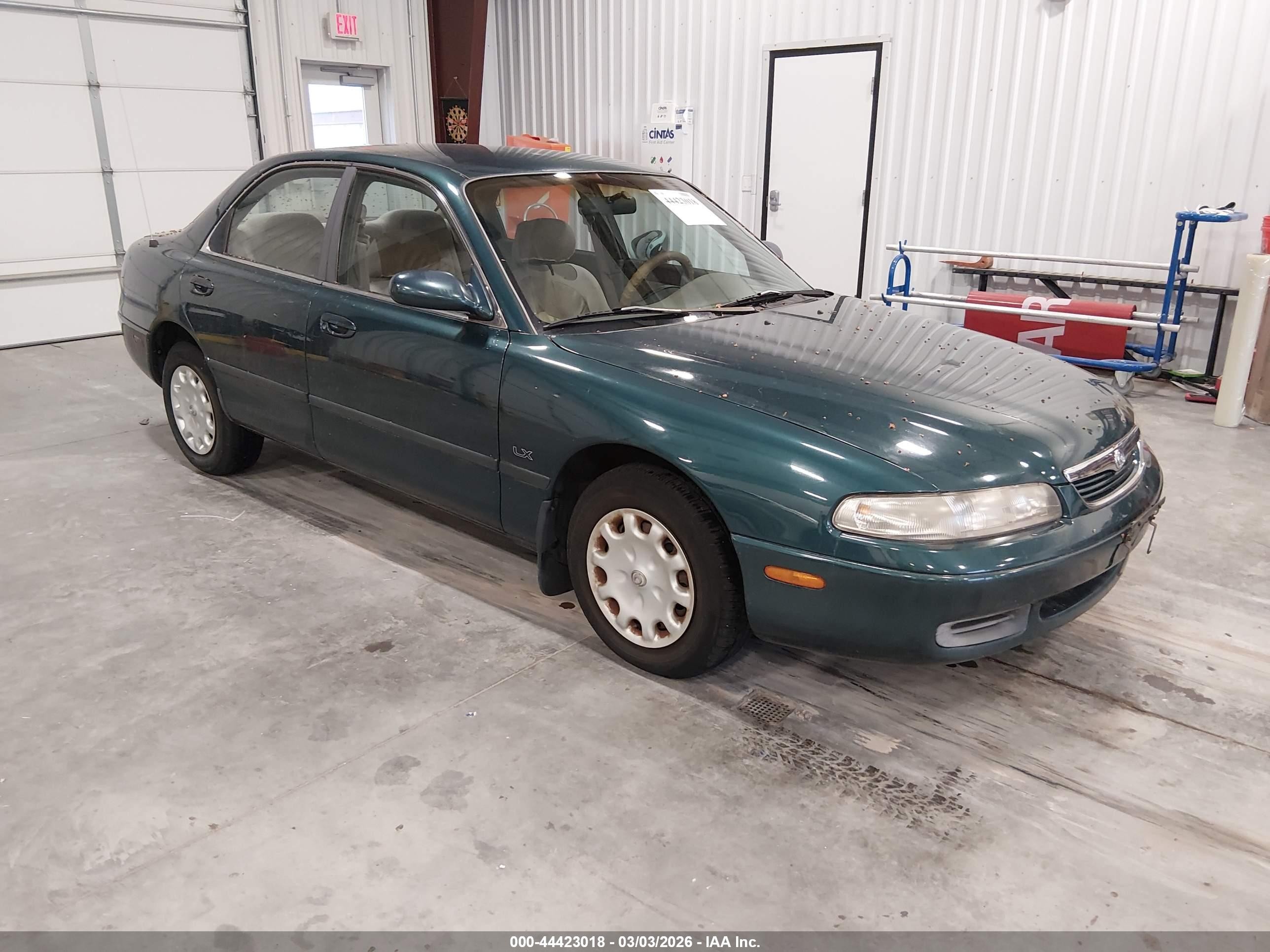 1997 Mazda 626 DX, VIN 1YVGE22C2V5621666 — Mechanical