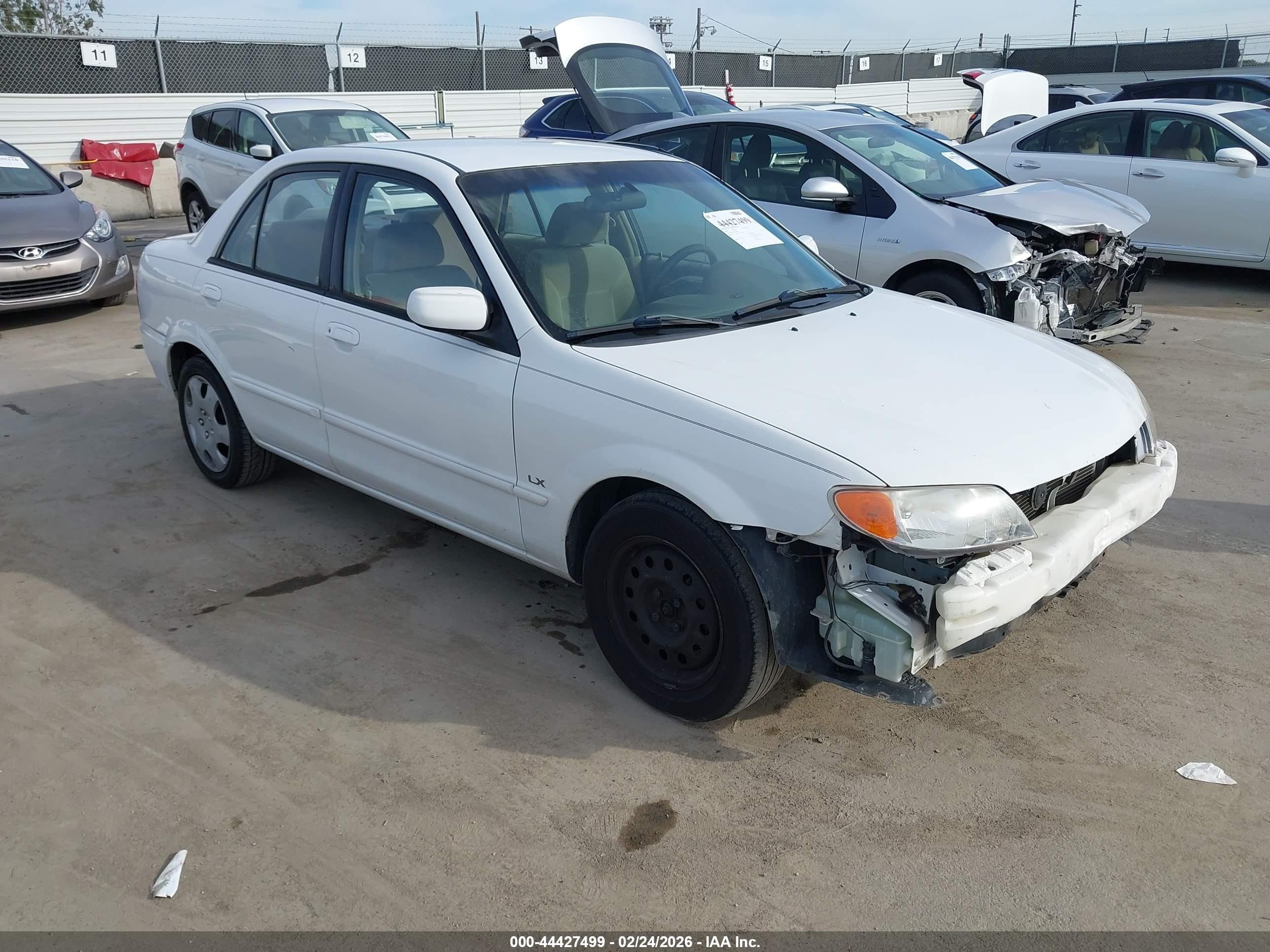 2002 Mazda Protege DX, VIN JM1BJ225421566962 — Front end