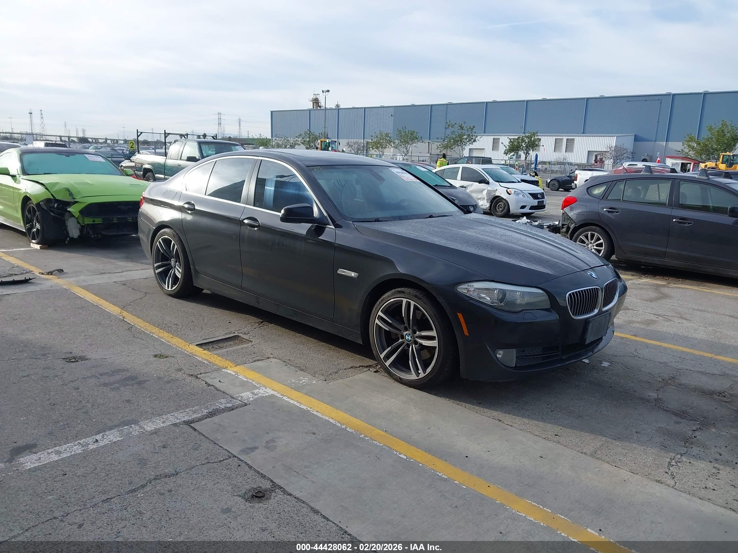 2011 BMW 5 Series 528i, VIN WBAFR1C57BC739247 — Side
