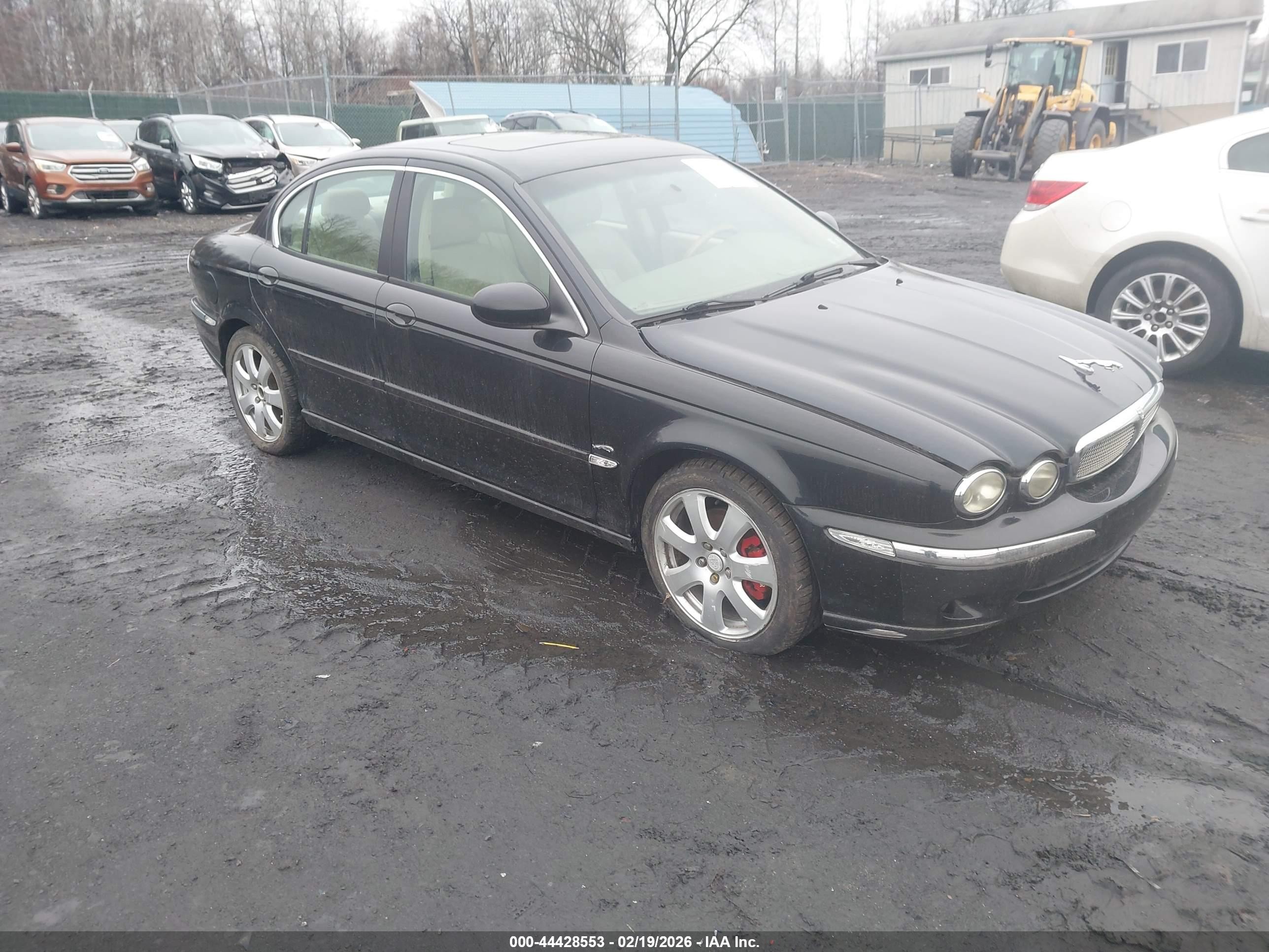 2005 Jaguar X-Type 3.0L, VIN SAJWA51AX5WE57144 — Side