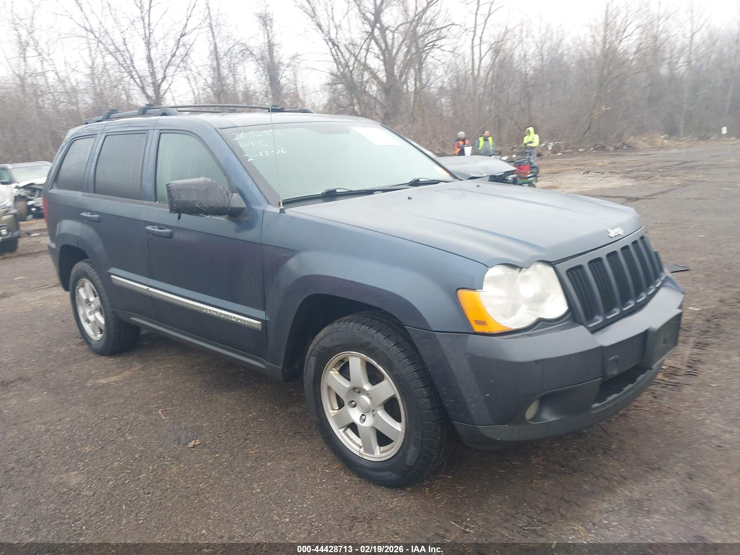 2010 Jeep Grand Cherokee Laredo, VIN 1J4PR4GK3AC104060 — Side