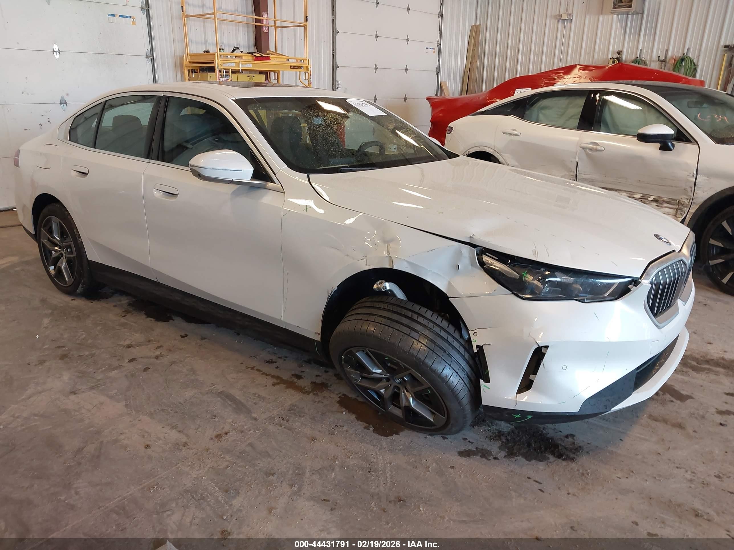 2025 BMW i5 xDrive40, VIN WBY13HG00SCT27501 — Side