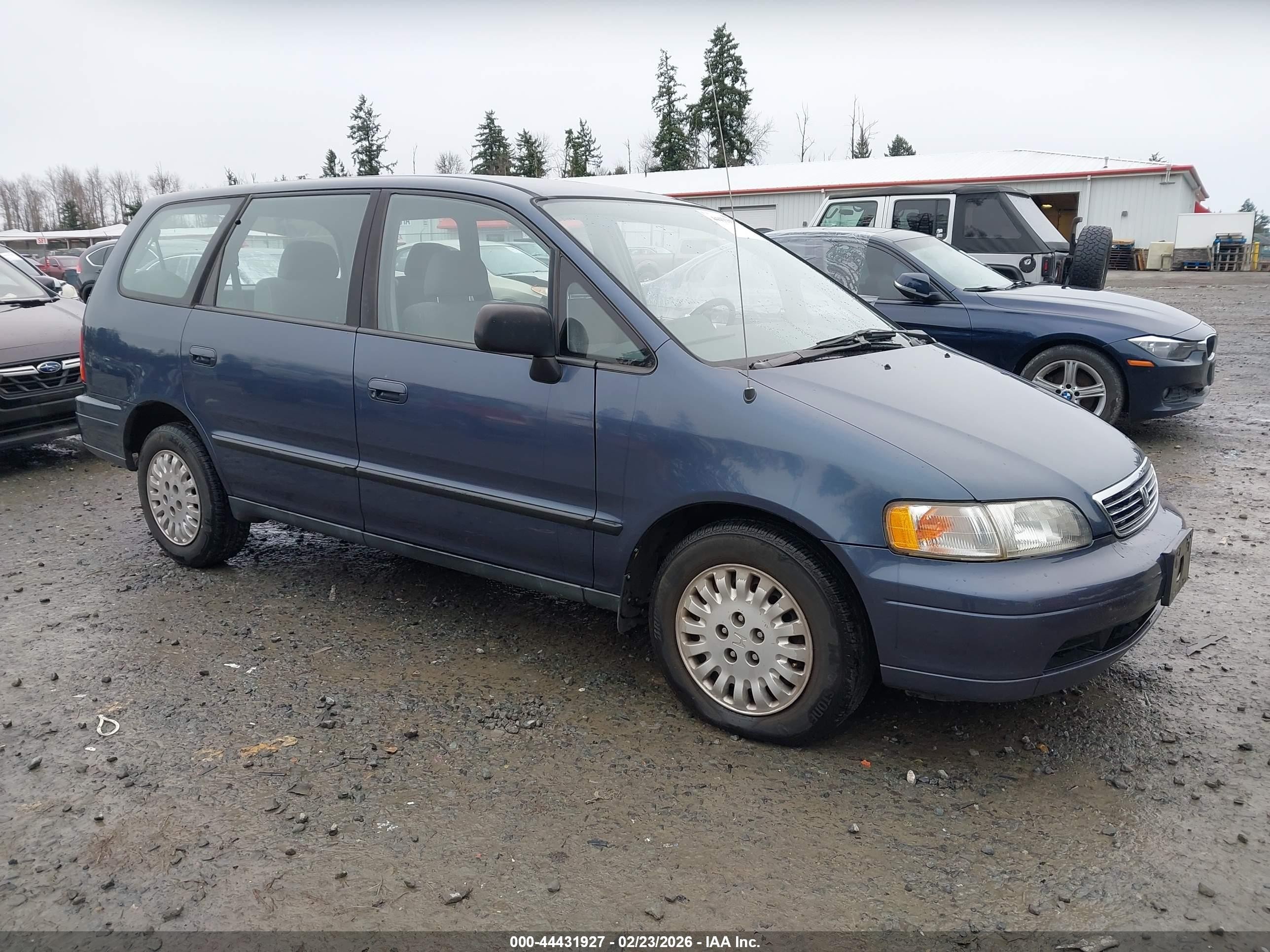1995 Honda Odyssey LX, VIN JHMRA1840SC021657 — Side