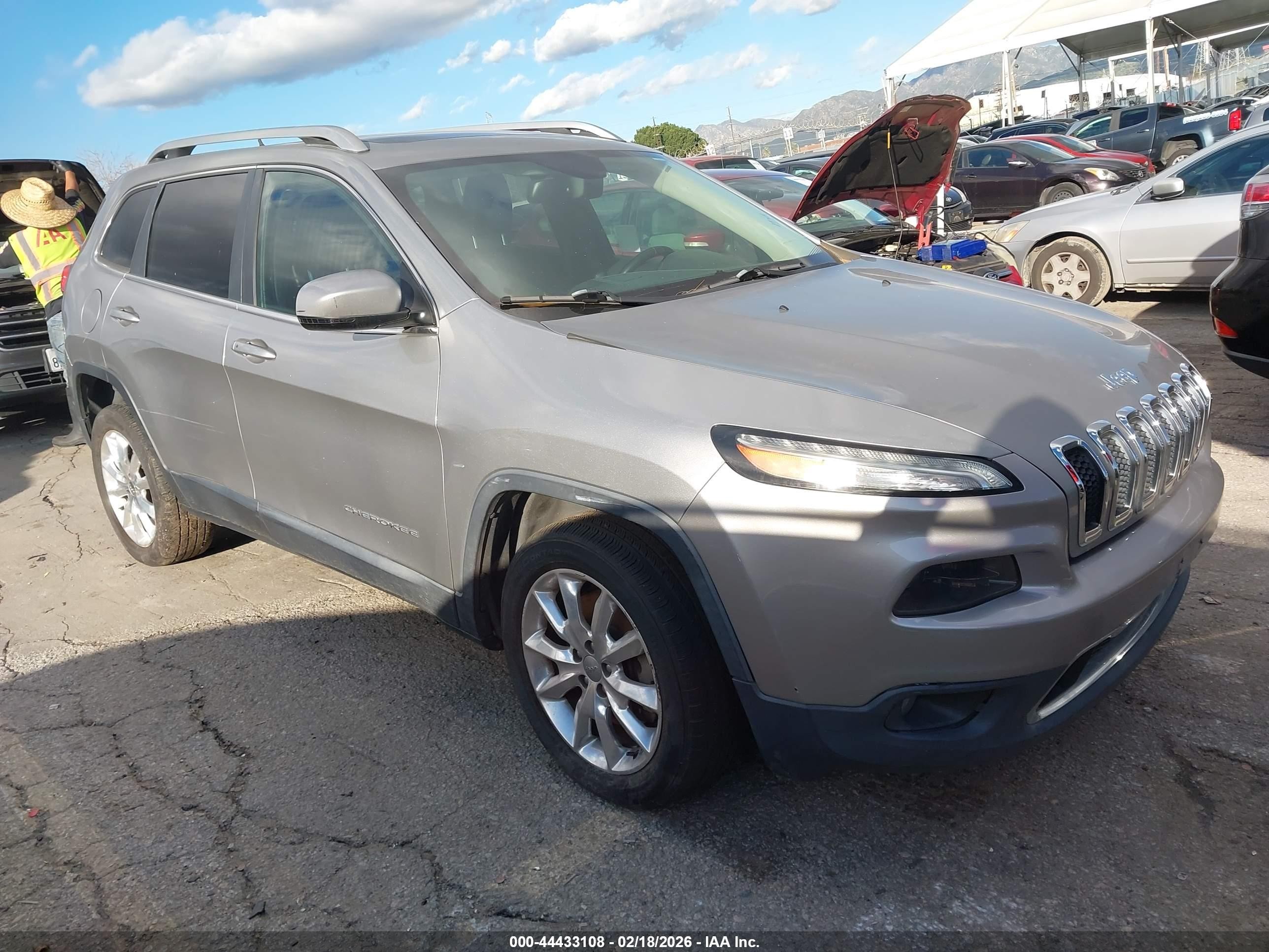 2015 Jeep Cherokee Limited, VIN 1C4PJLDS5FW731554 — Бок