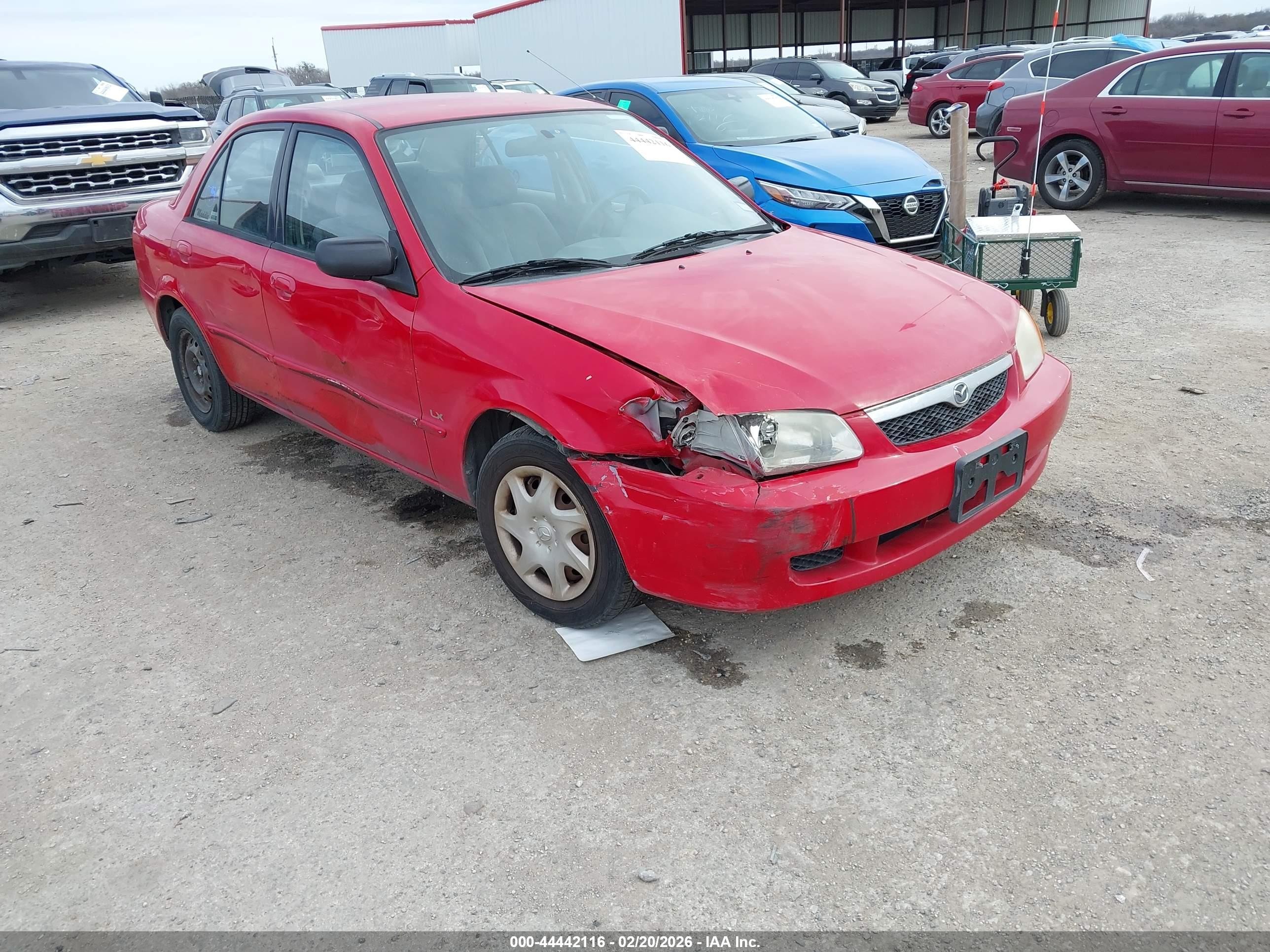 1999 Mazda Protege DX, VIN JM1BJ2227X0136006 — Перед