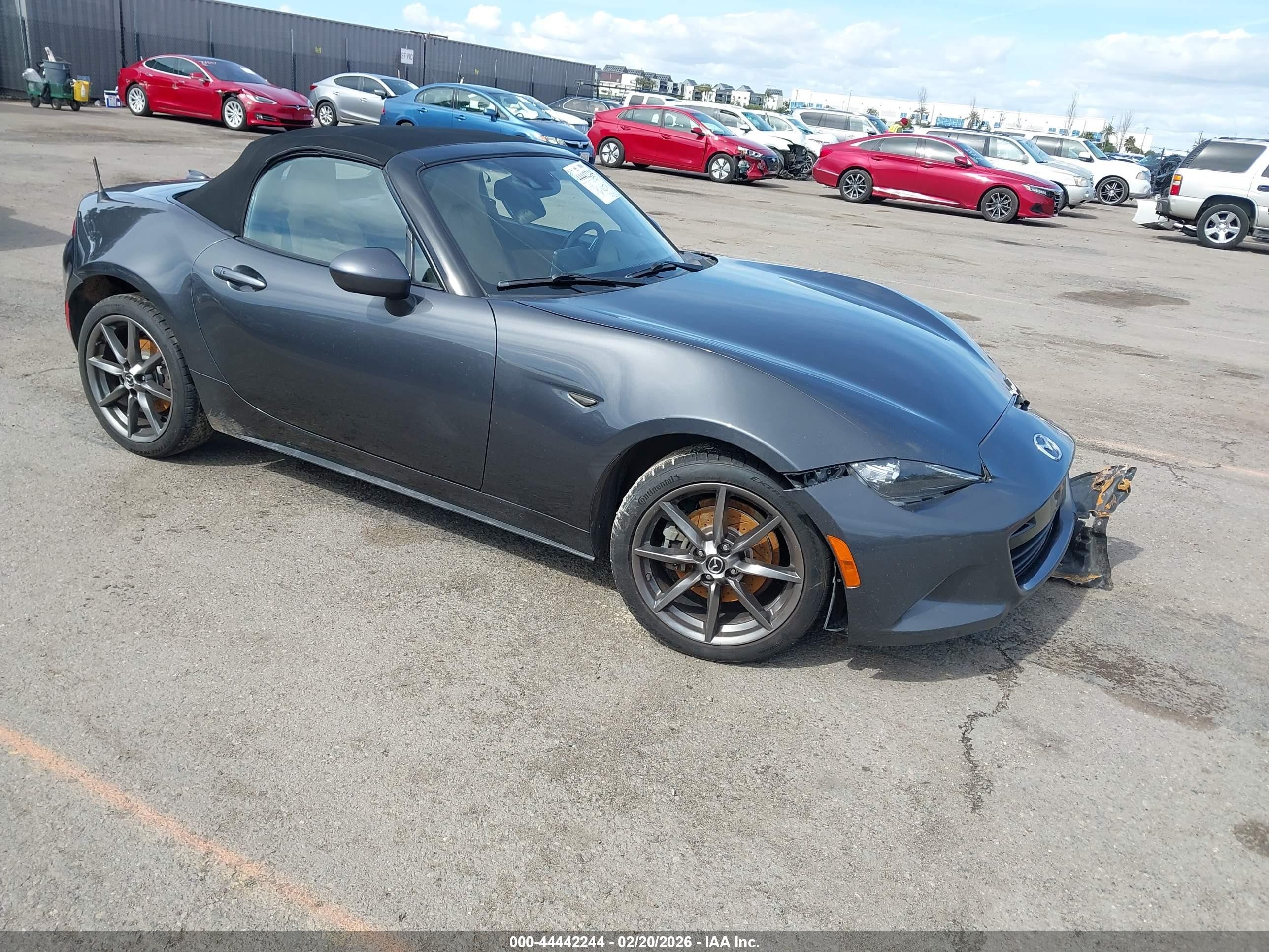 2016 Mazda MX-5 Miata Grand Touring, VIN JM1NDAD74G0107182 — Side