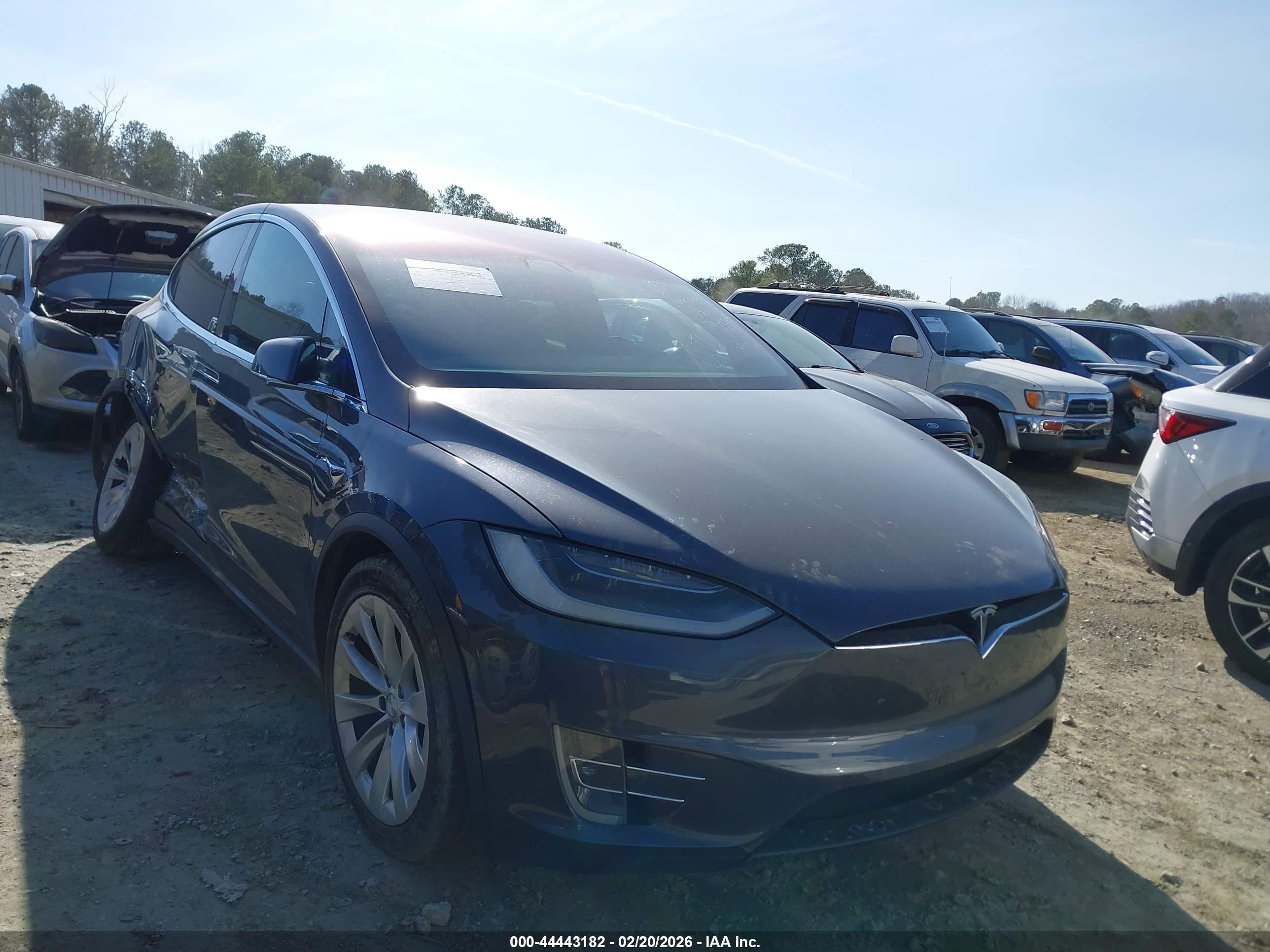 2019 Tesla Model X 75D, VIN 5YJXCAE23KF181900 — Side