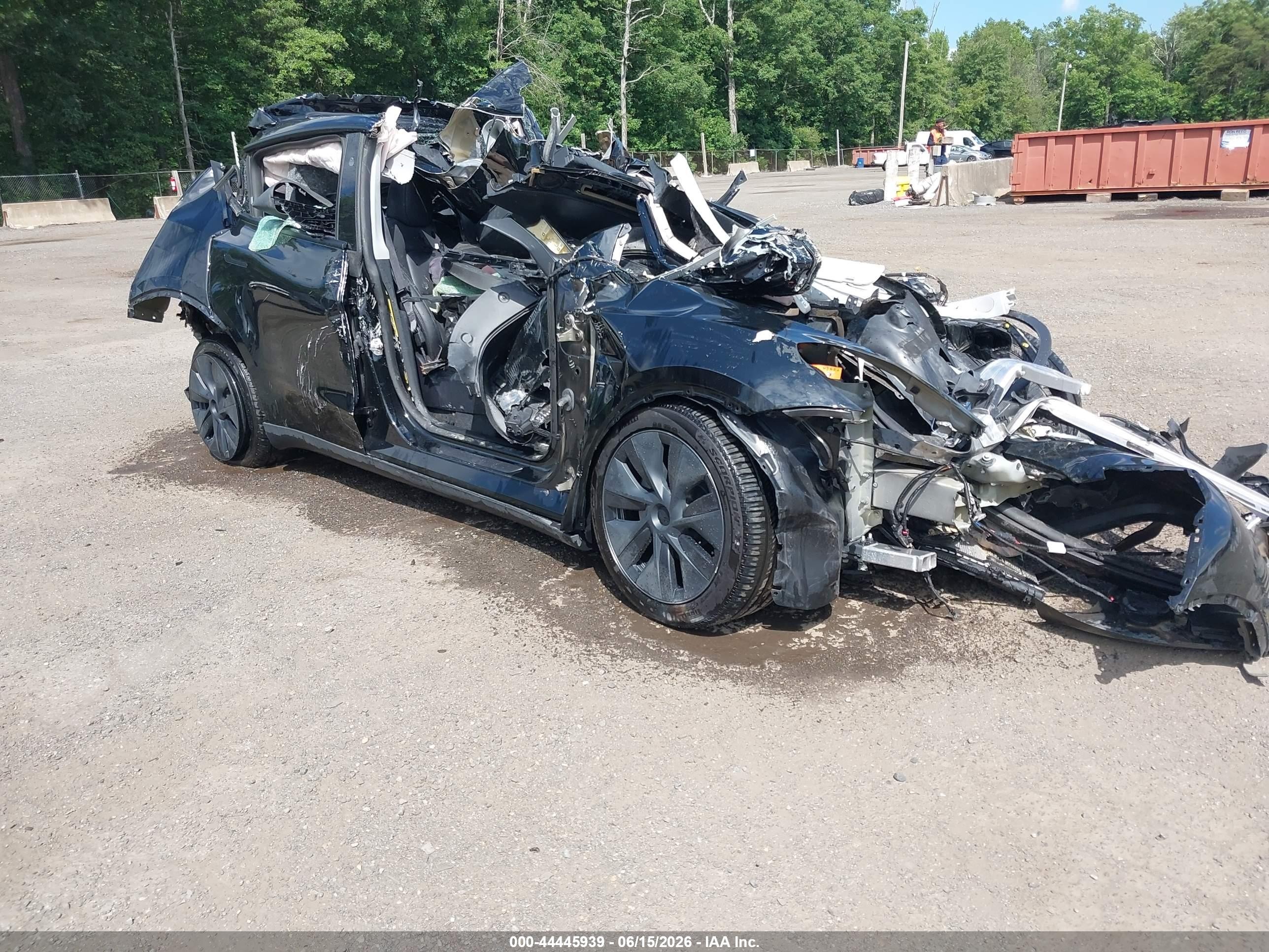 2024 Tesla Model Y, VIN 7SAYGDED9RF155424 — Rollover