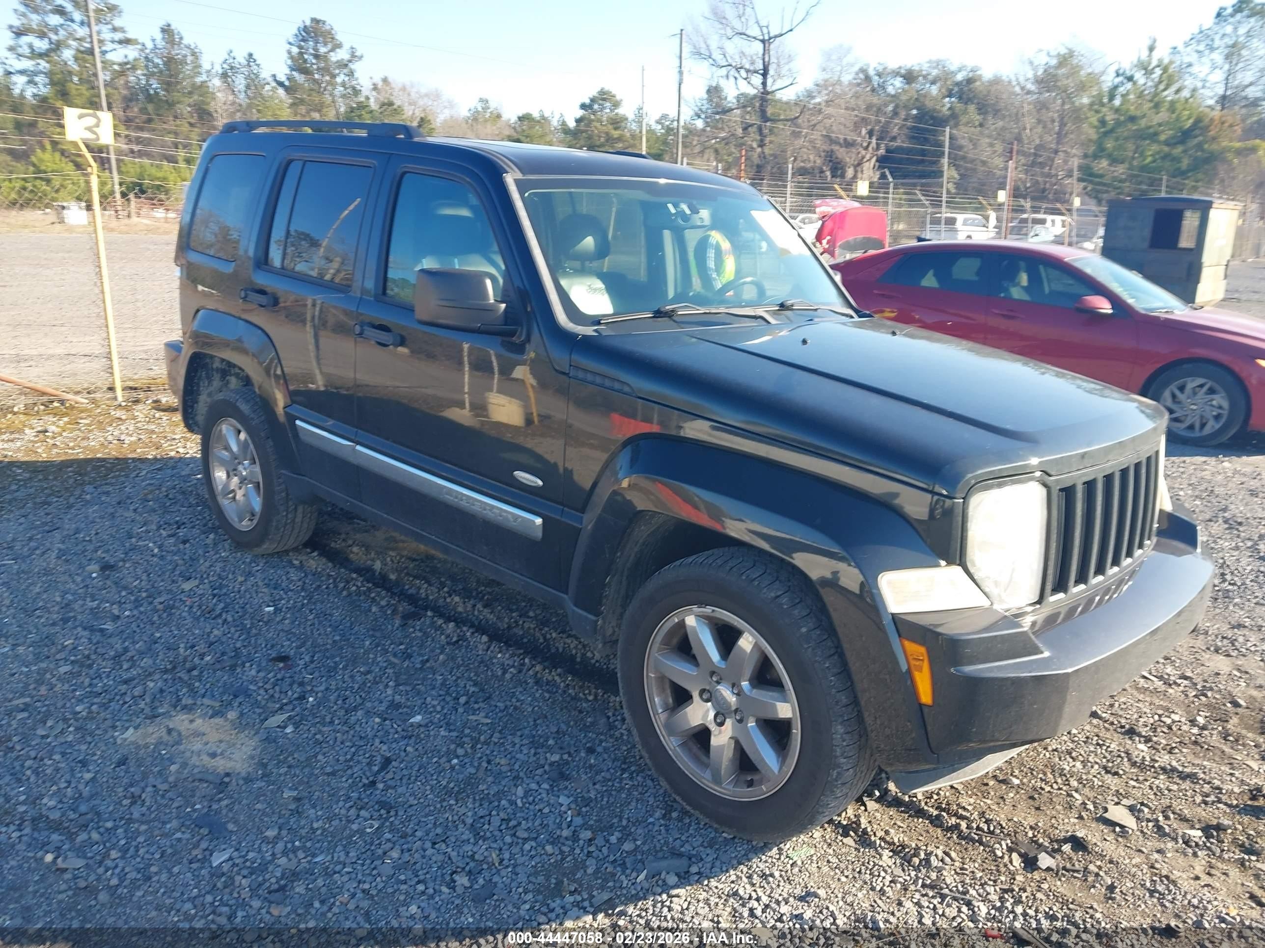 2012 Jeep Liberty Sport, VIN 1C4PJMAK5CW203566 — Зад