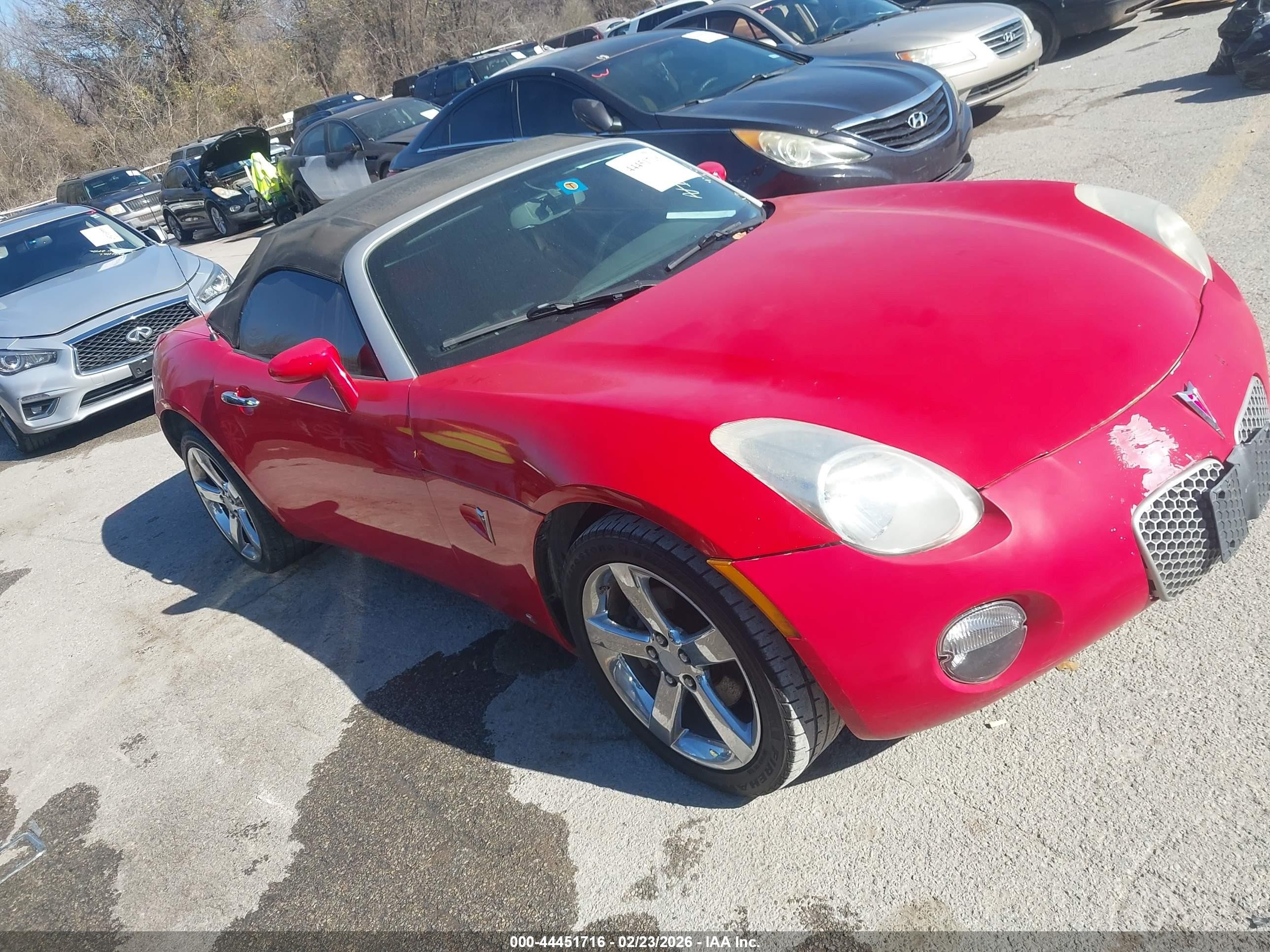 2009 Pontiac Solstice, VIN 1G2MN35B09Y106935 — Side