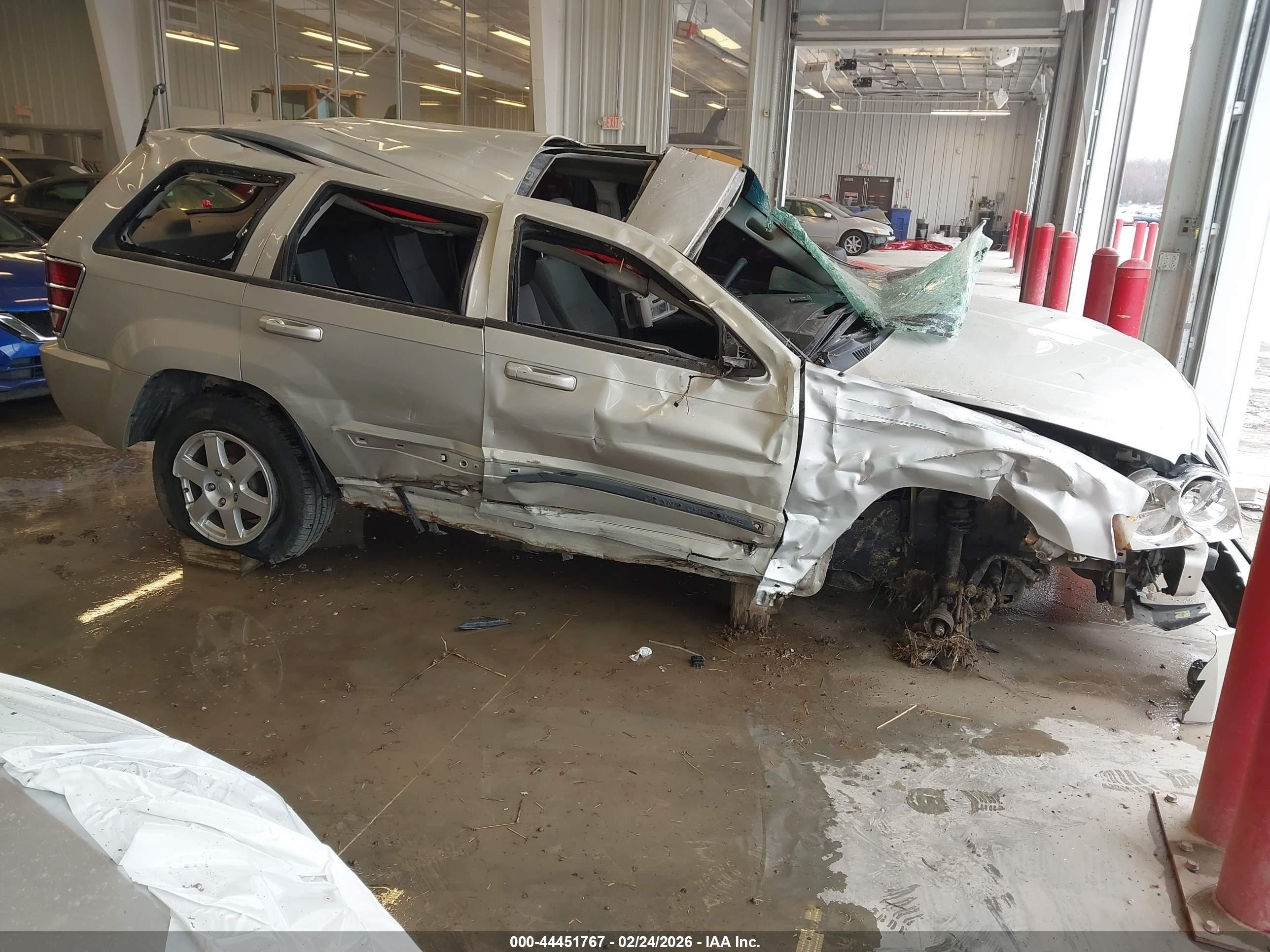 2008 Jeep Grand Cherokee Laredo, VIN 1J8GR48K98C247456 — Rollover