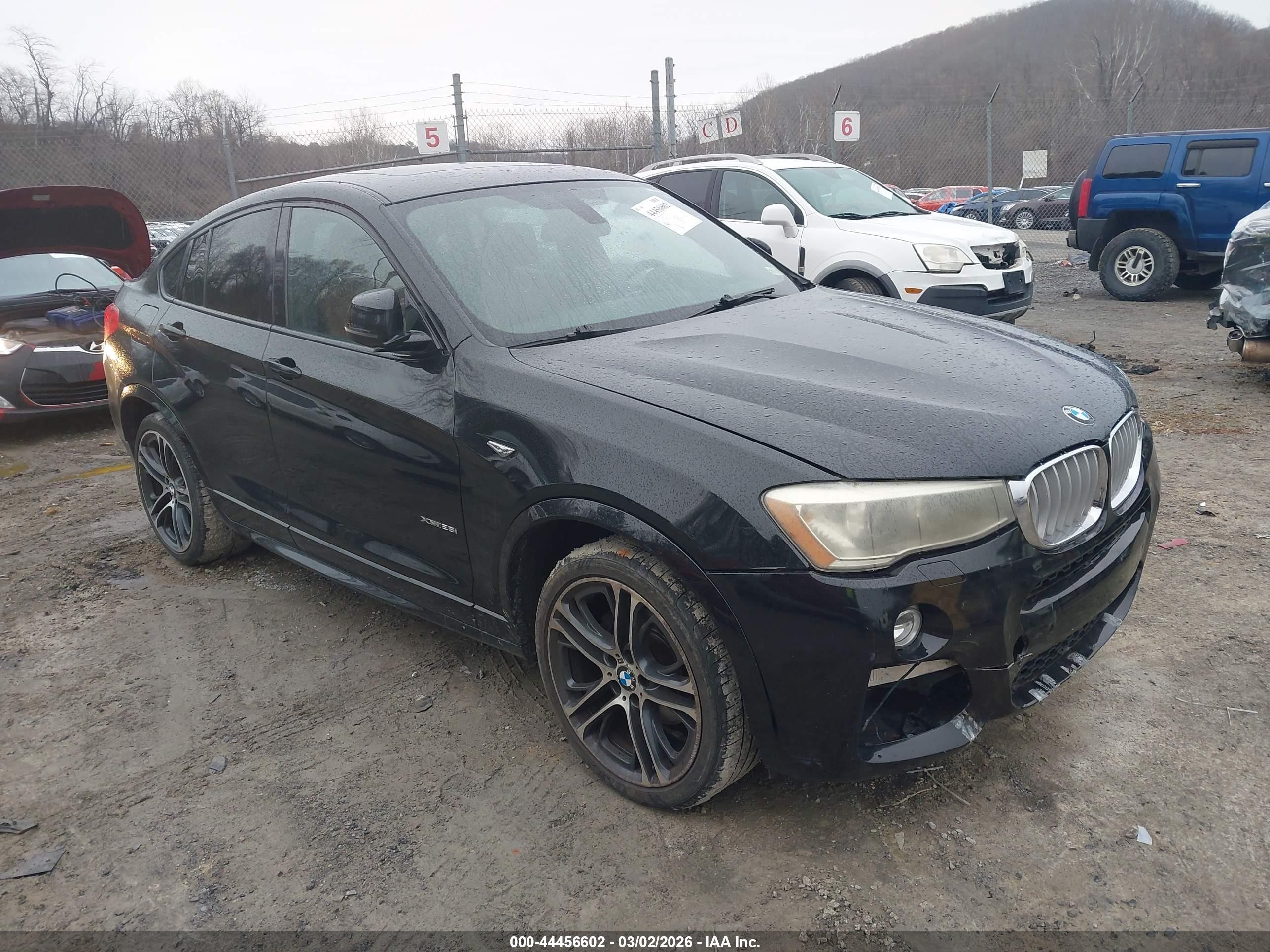 2015 BMW X4 xDrive28i, VIN 5UXXW3C51F0M88419 — Front end