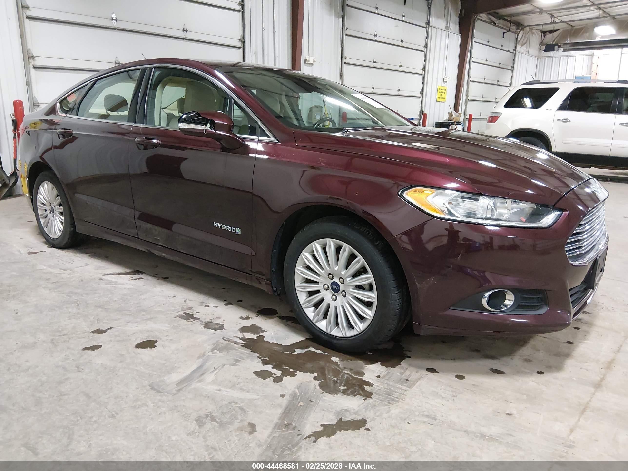 2013 Ford Fusion SE Hybrid, VIN 3FA6P0LU9DR273356 — Side
