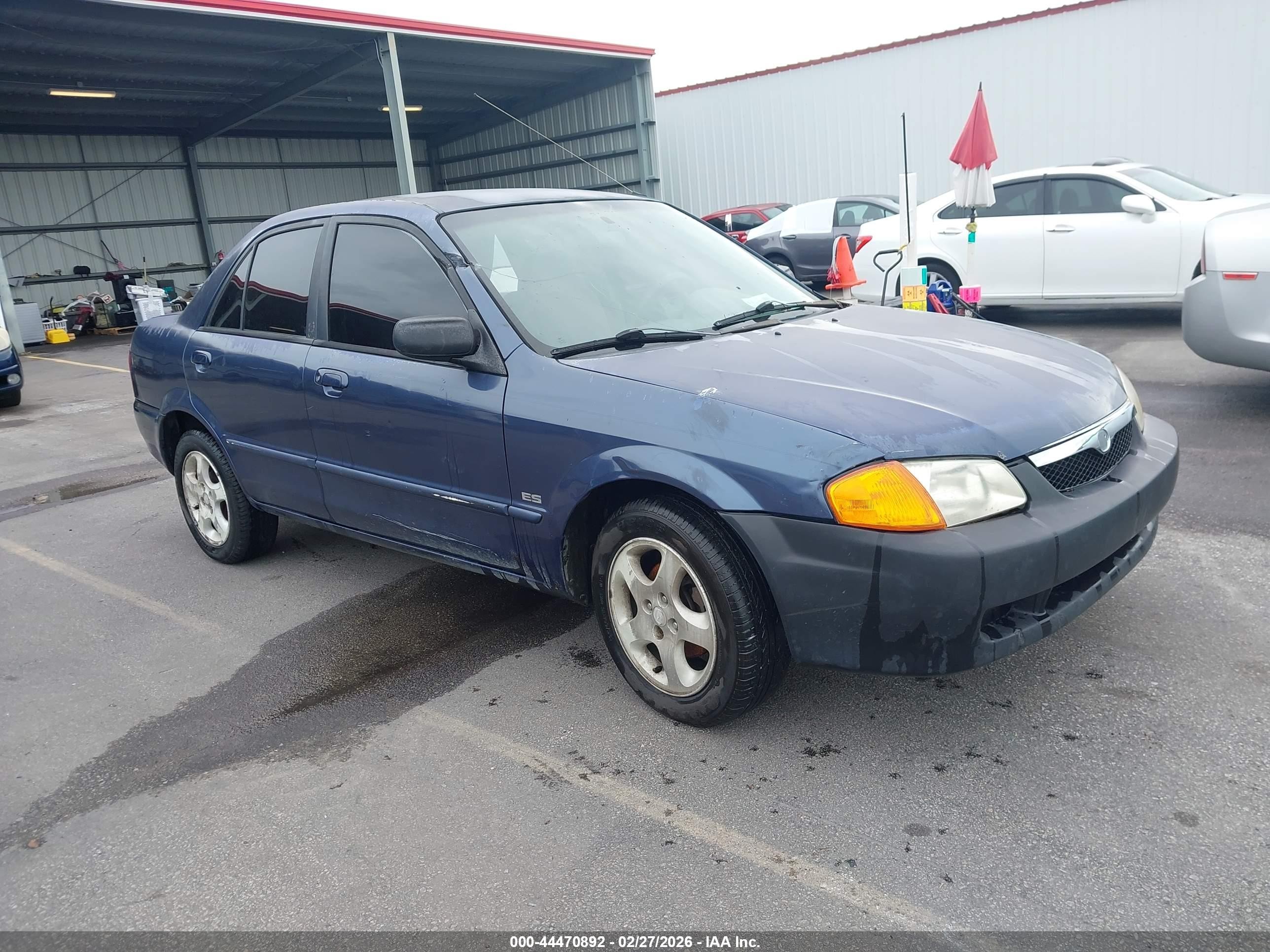 2000 Mazda Protege ES, VIN JM1BJ2210Y0237977 — Side
